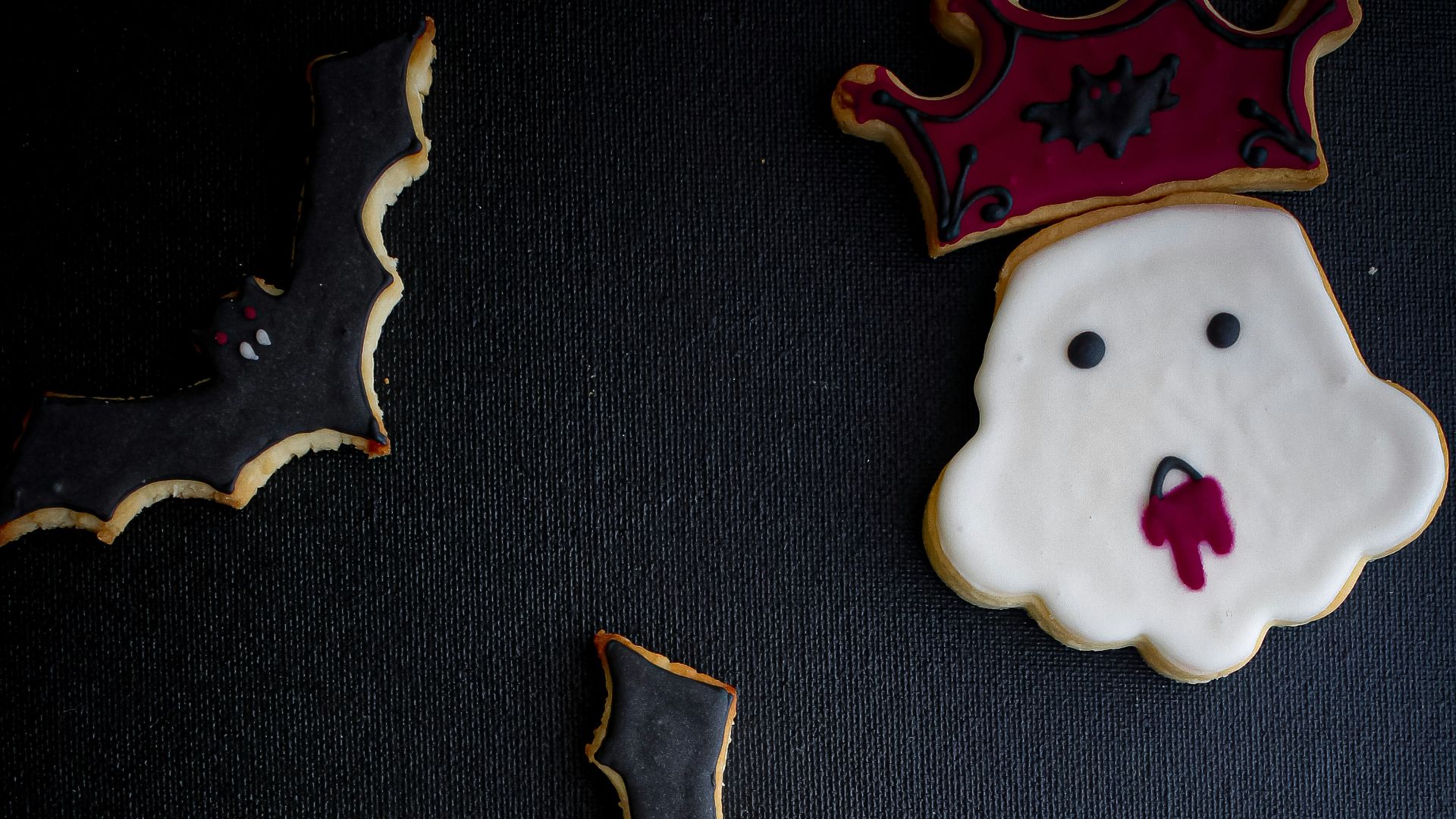 a group of small white and blue objects with faces on them