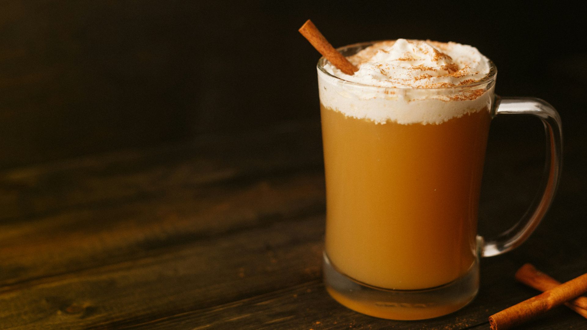 clear drinking glass with brown liquid