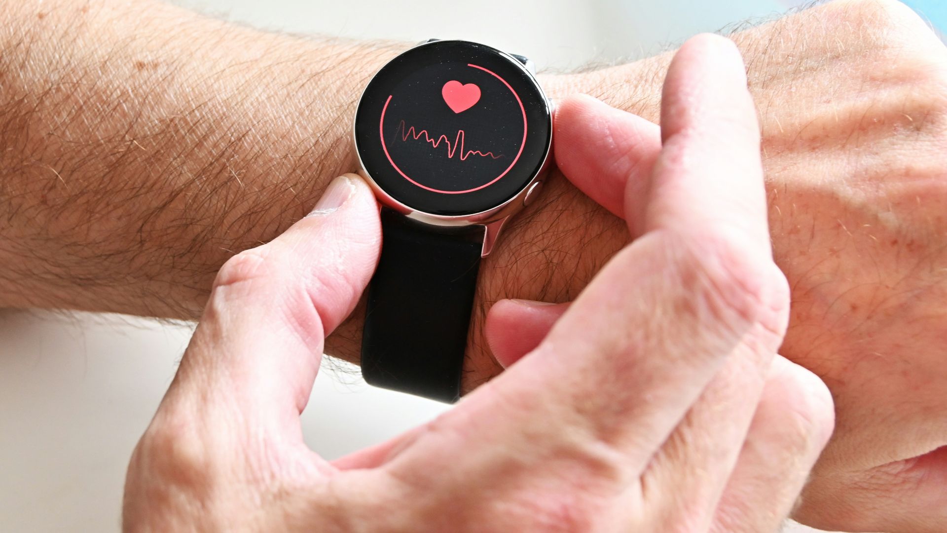 a person holding a stopwatch