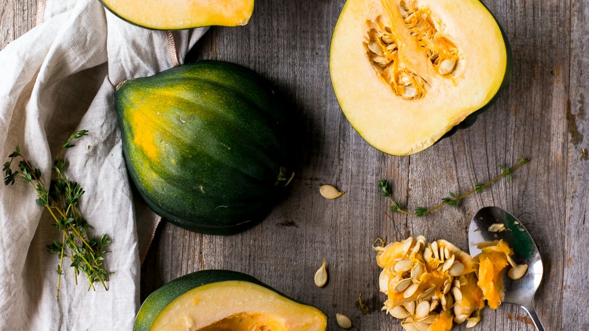 green and yellow squash on brown surface