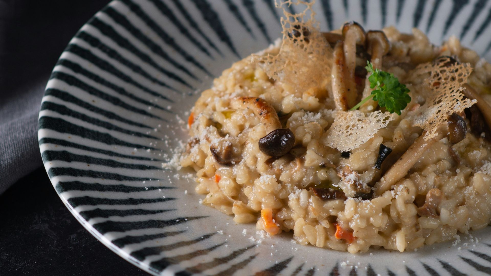 cooked rice with green vegetable on white round plate