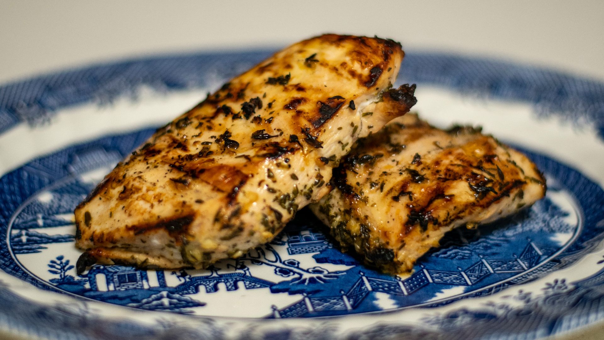 brown bread on white and blue ceramic plate