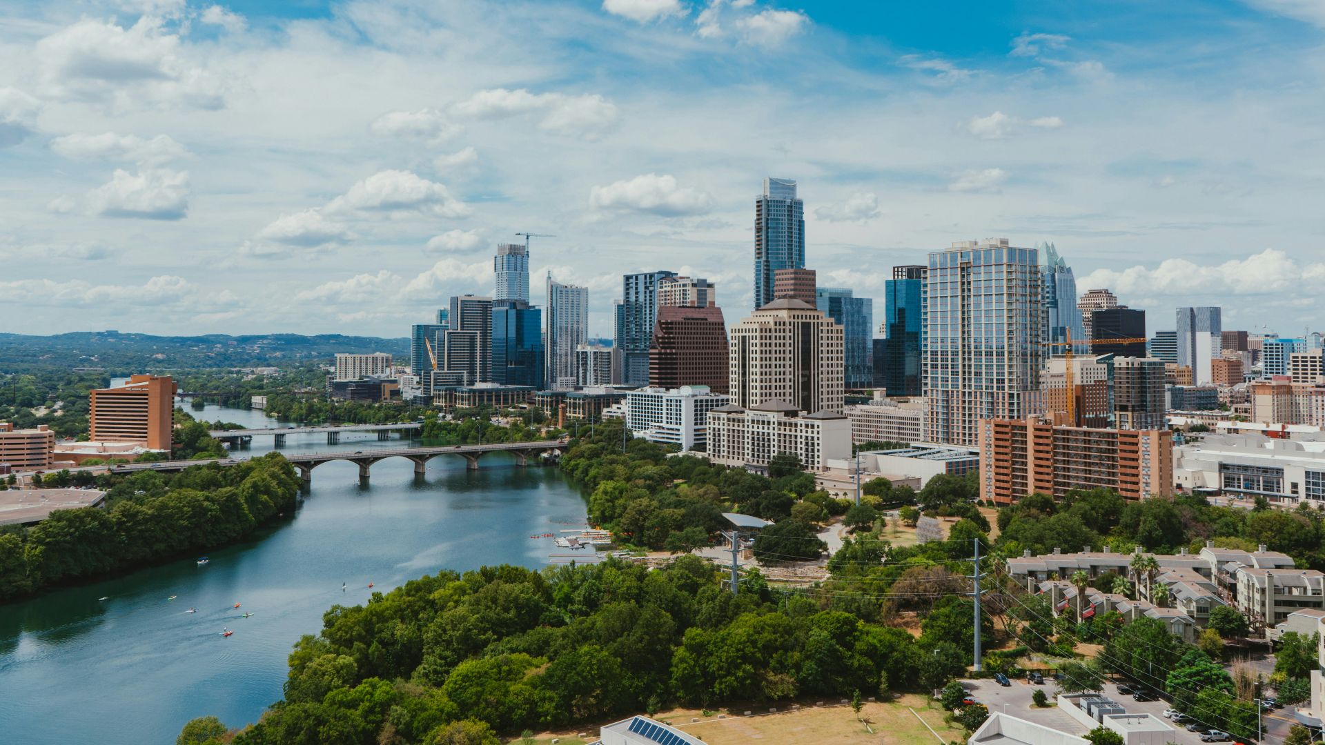 river near buildings during daytime