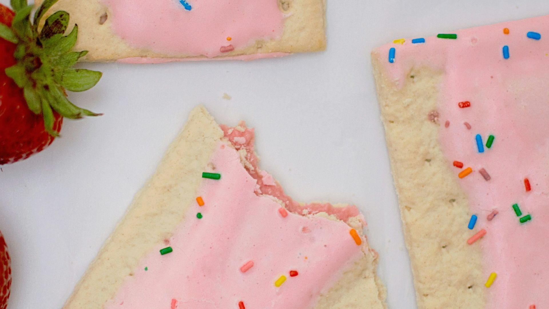 strawberries on white surface