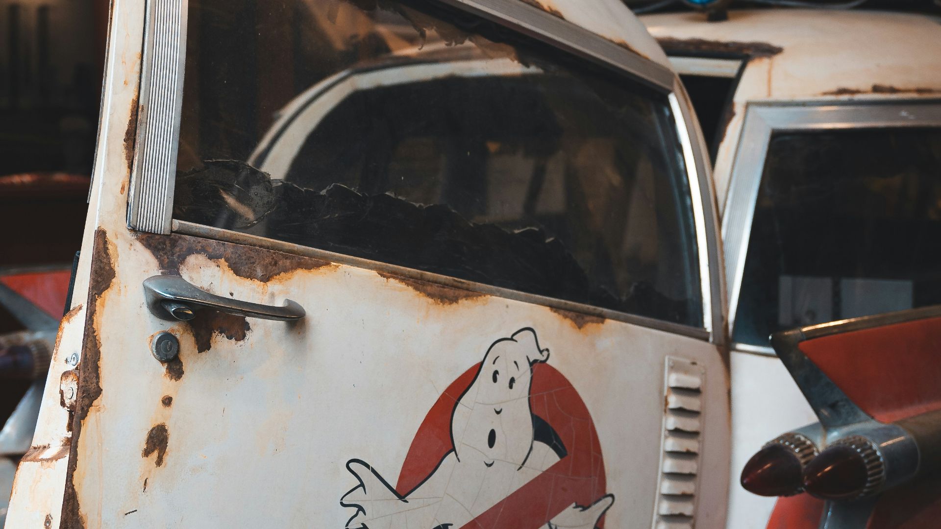a small truck parked on the side of a building