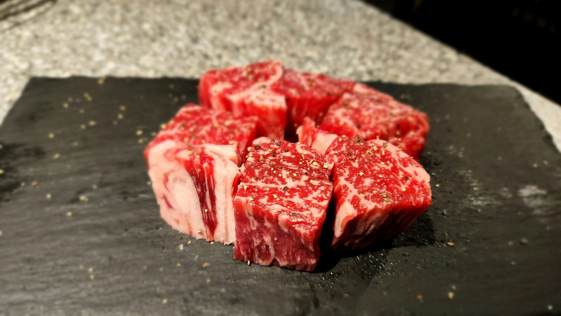 a piece of raw meat on a cutting board