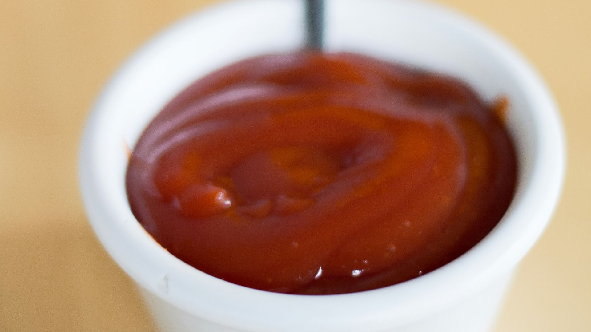 white ceramic mug with brown liquid