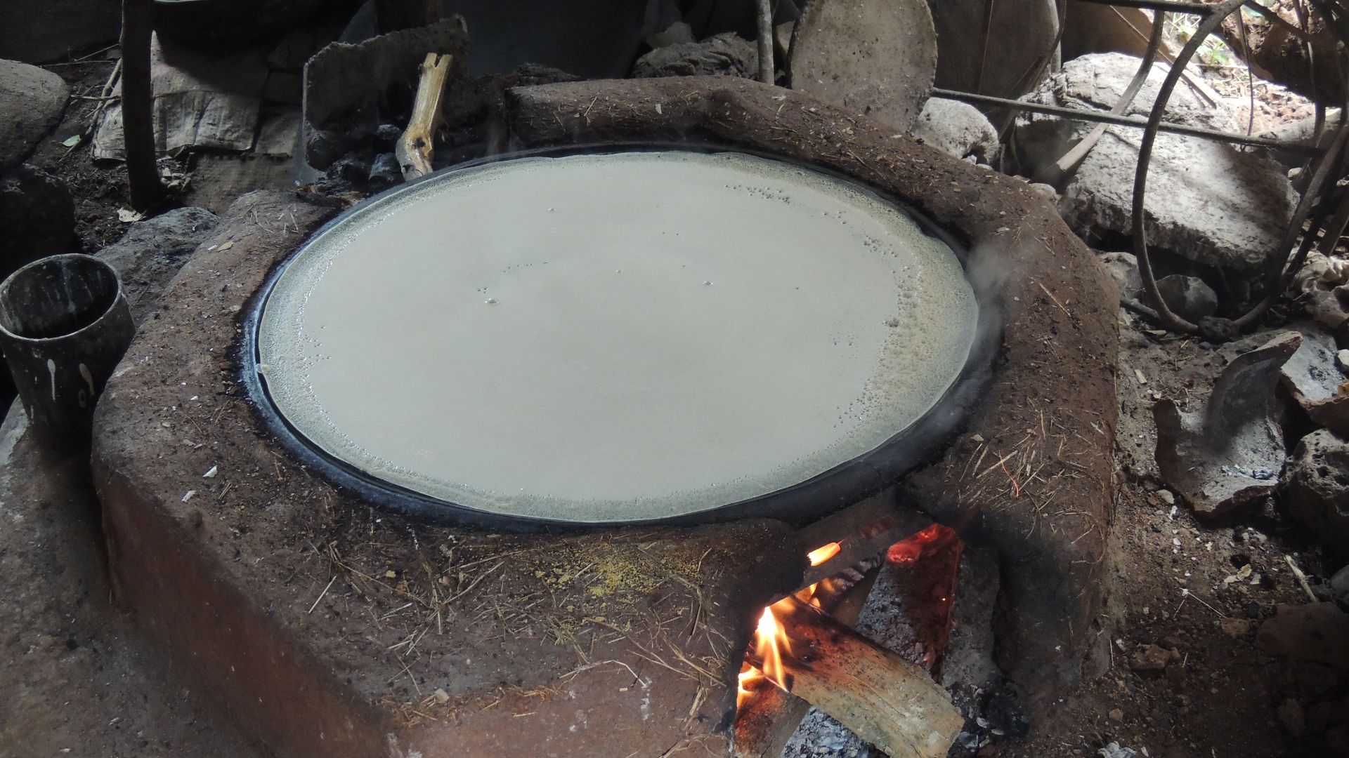 File:Injera stove .. and fresh Injera being cooked.JPG