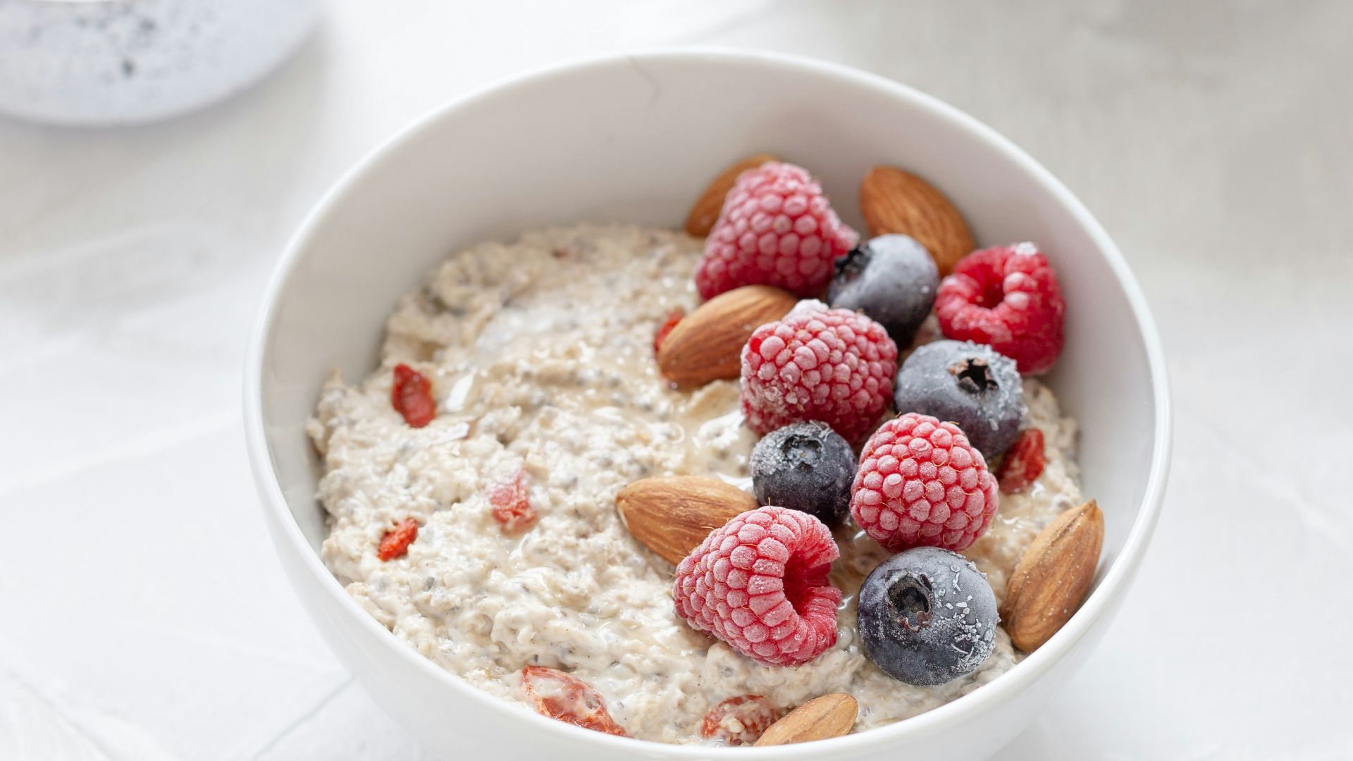 strawberries in white ceramic bowl