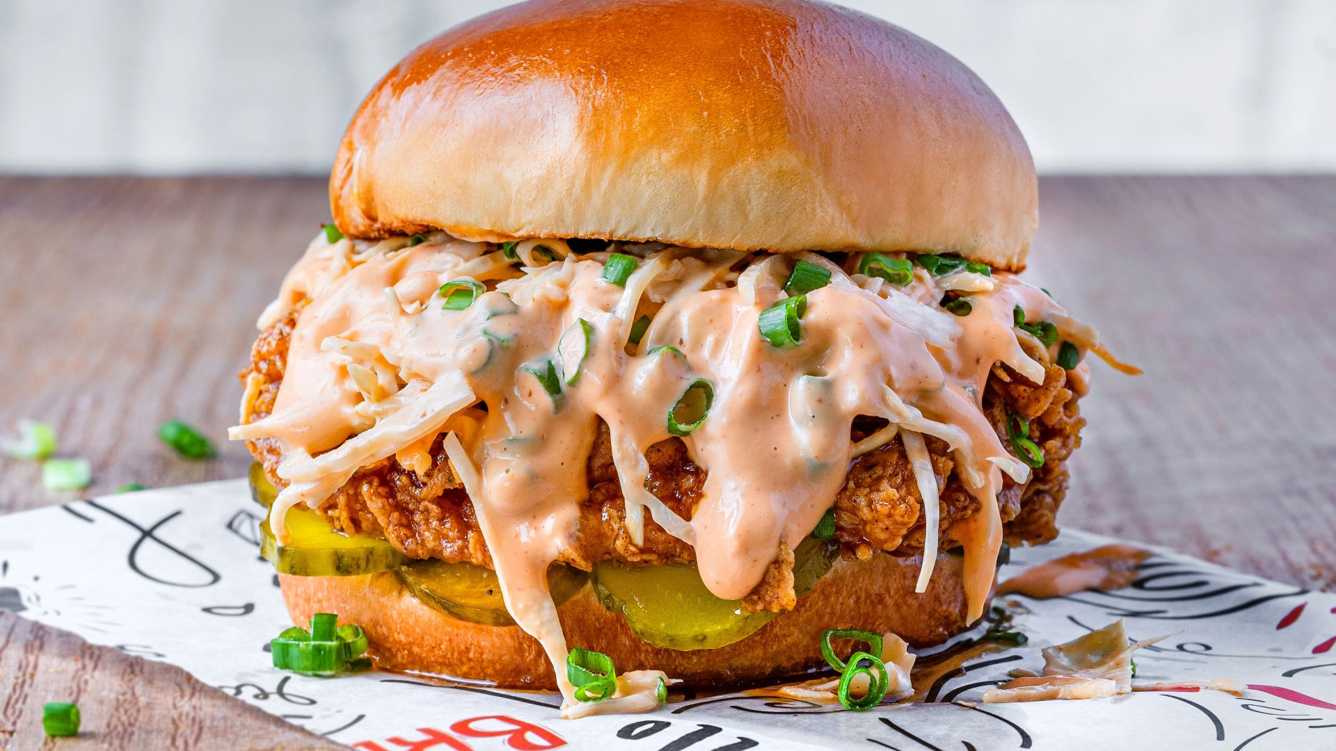 burger on white and red paper