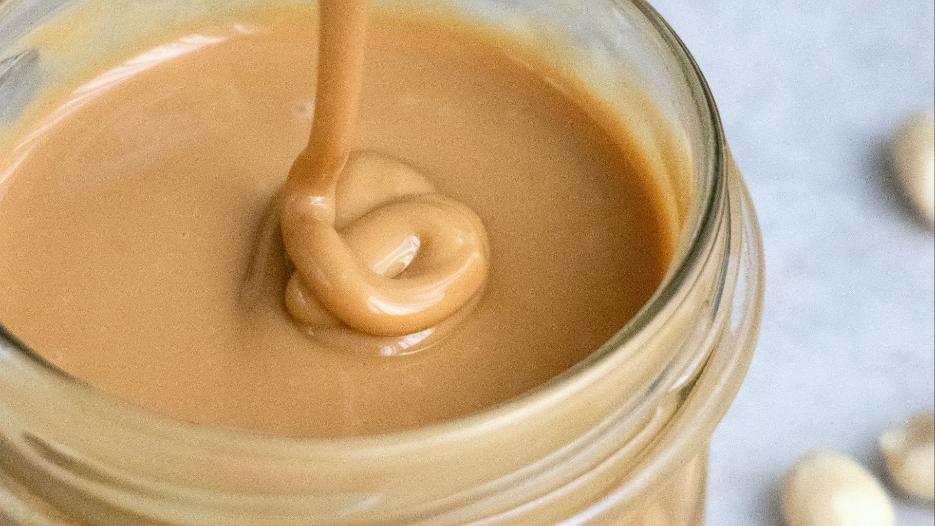 clear glass jar with brown liquid