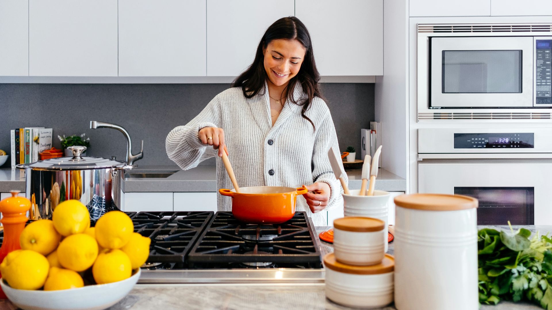 woman cooking inside kitchen room