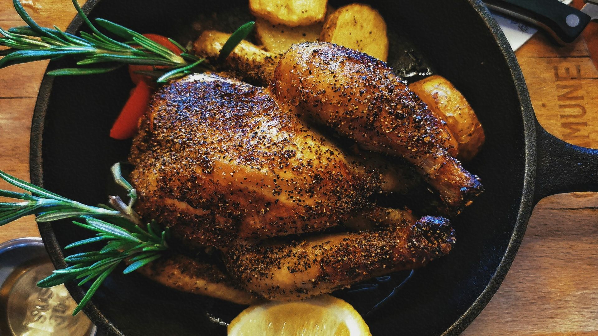 grilled meat on black round plate