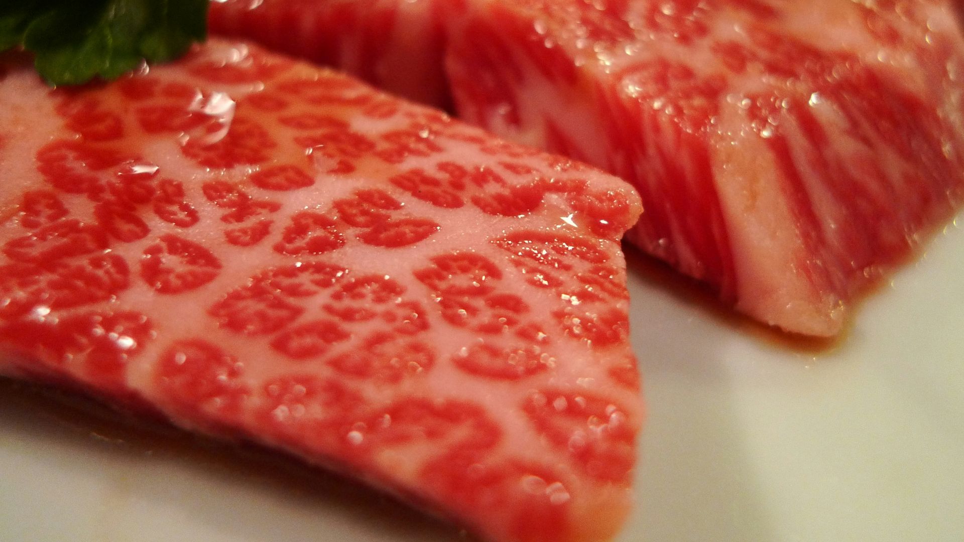 a close up of a plate of food with meat