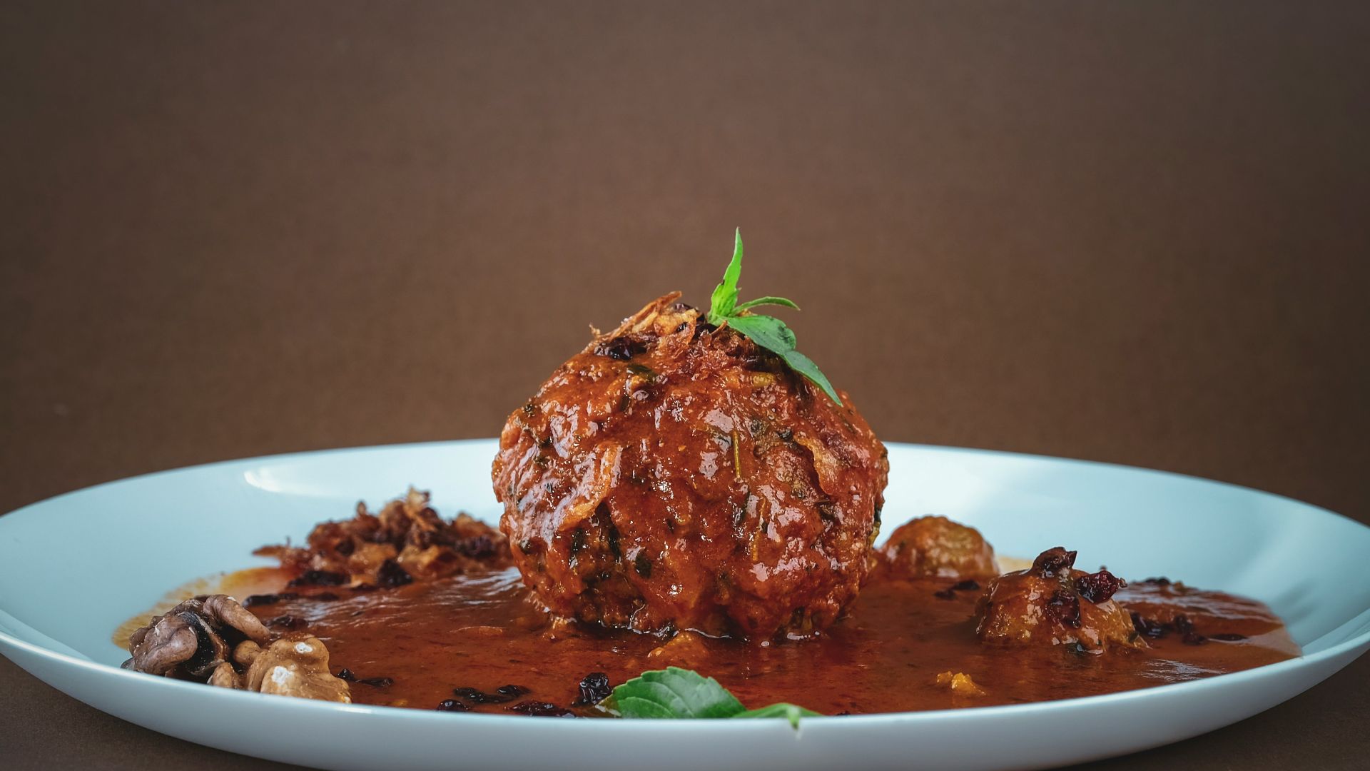 cooked meat on white ceramic plate