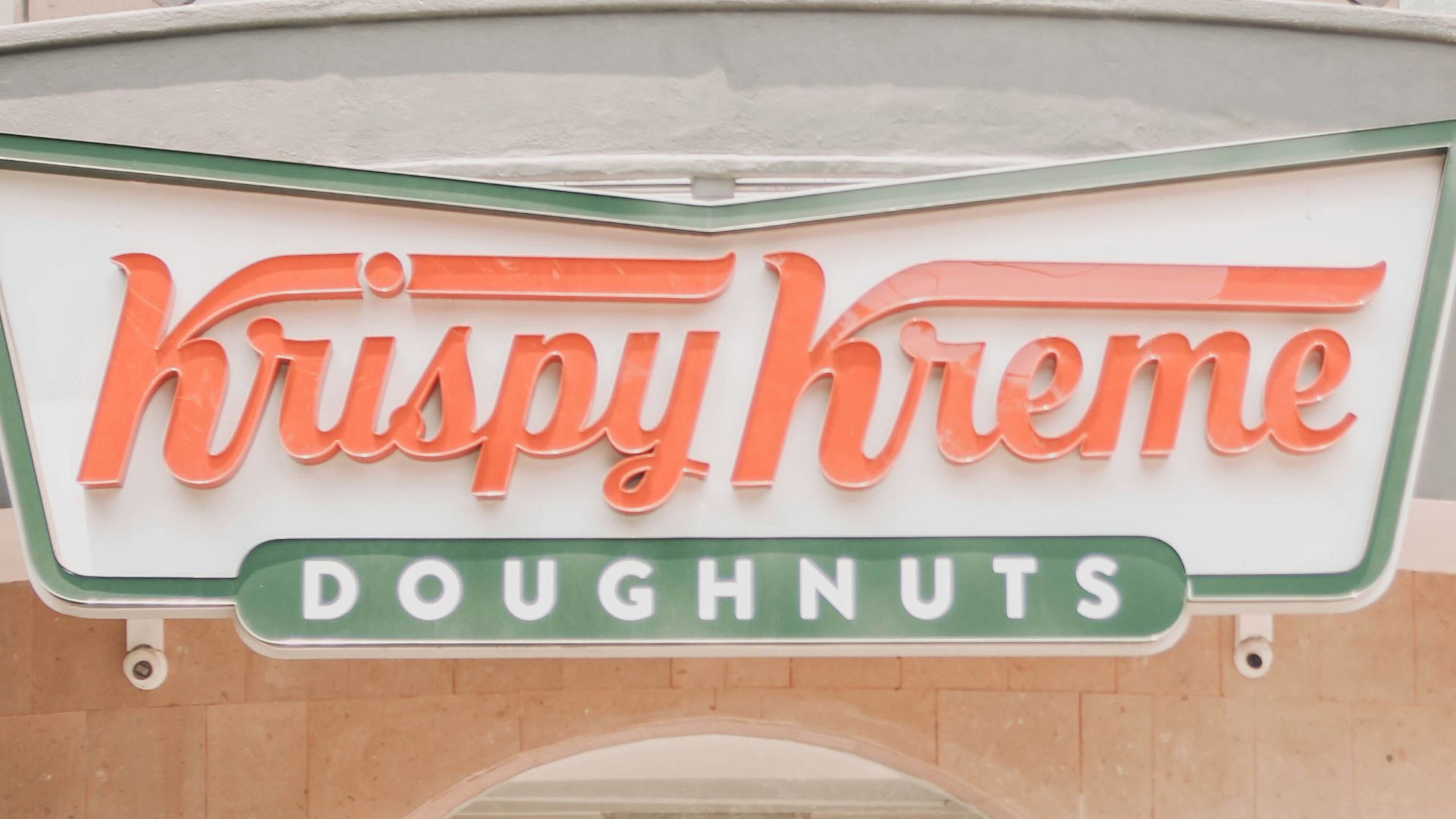 a store front with a sign above it