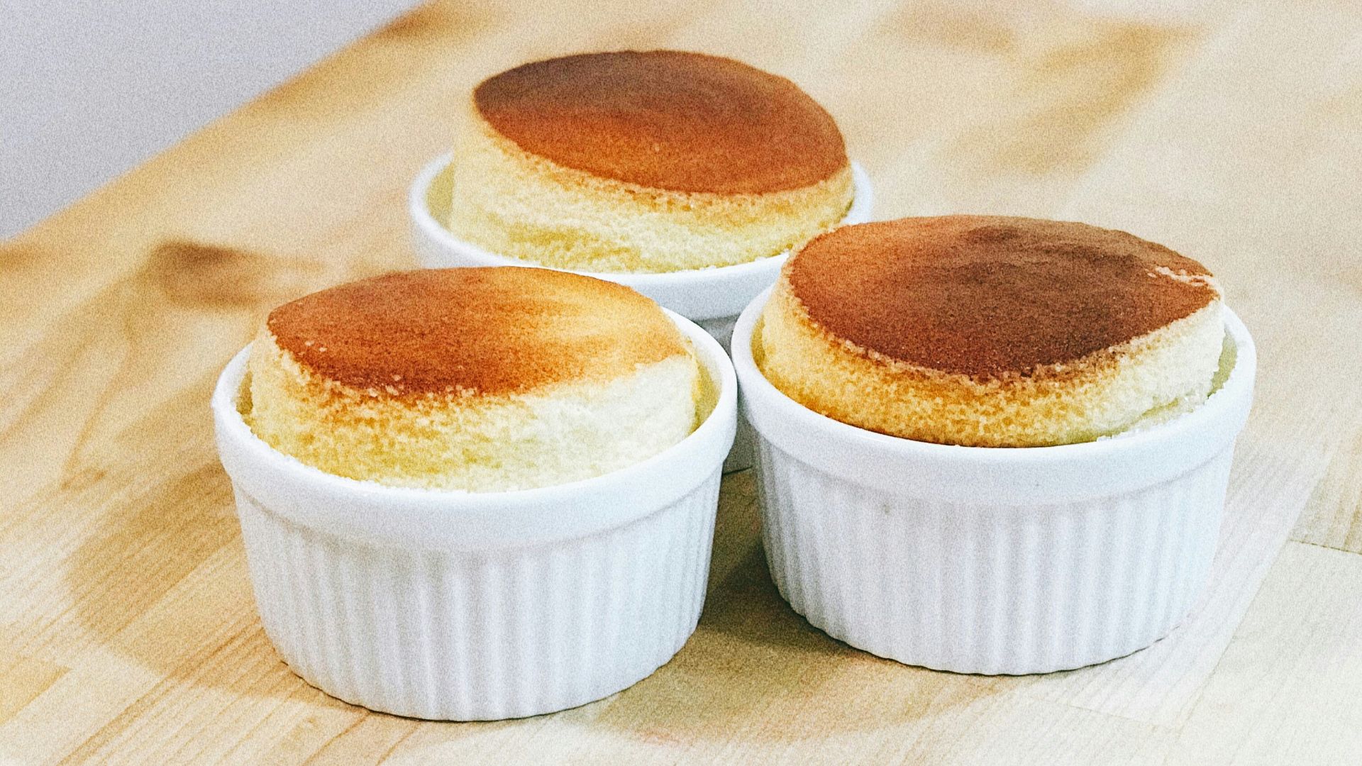 white ceramic bowl on brown wooden table