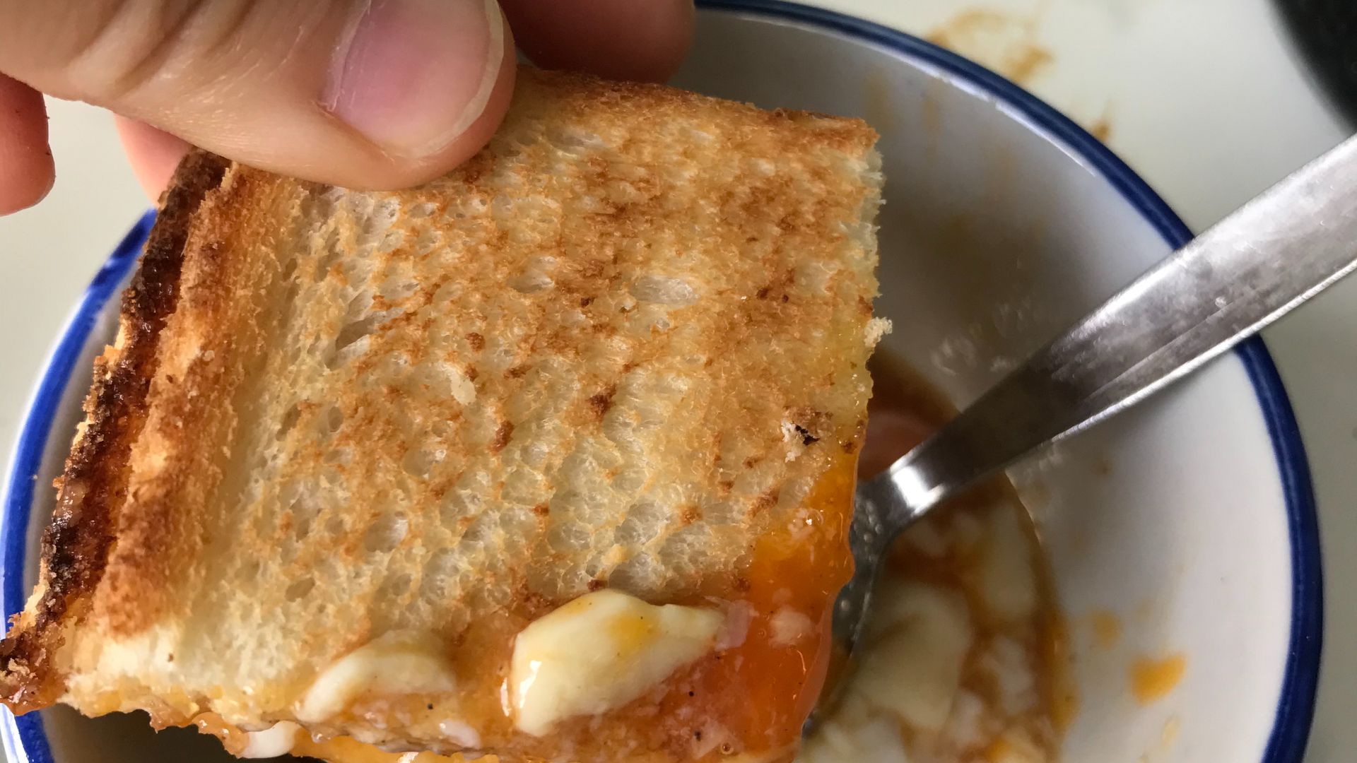 File:Kaya toast dip into soft boiled egg.jpg