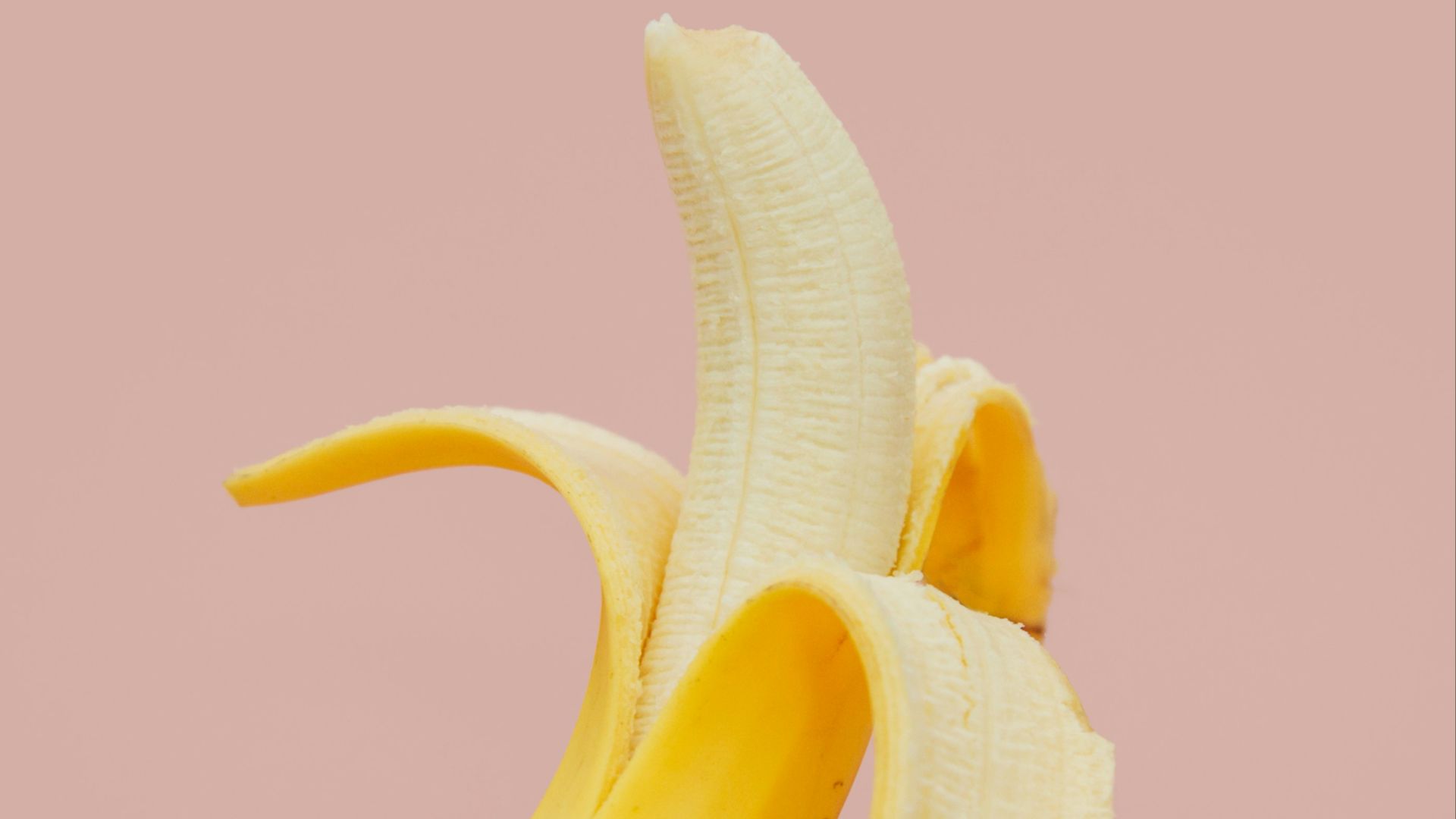 half peeled banana fruit