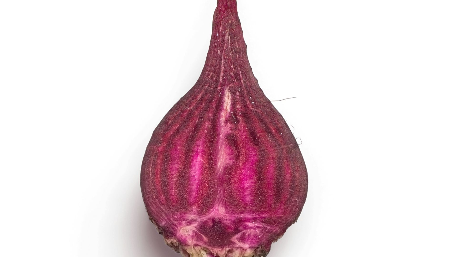 purple onion on white surface