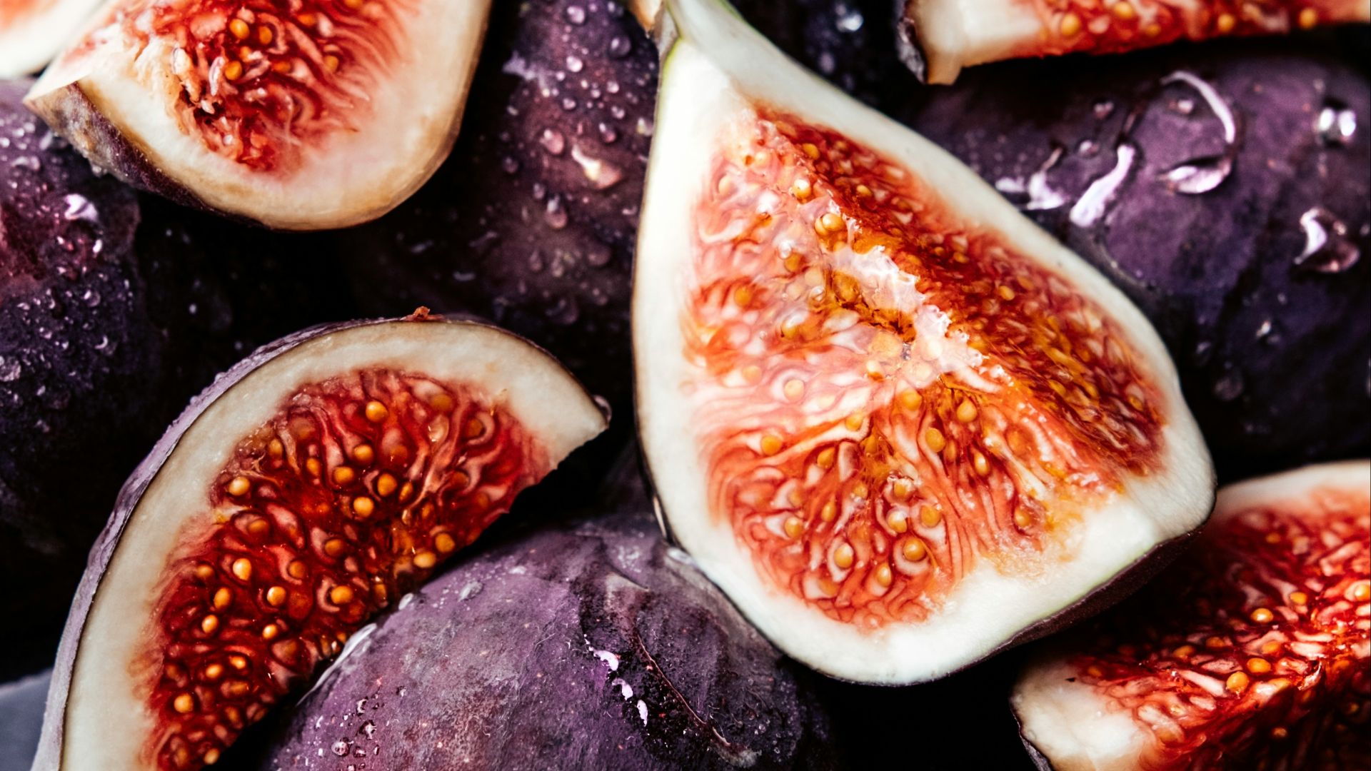 a bunch of figs that are sitting on a table
