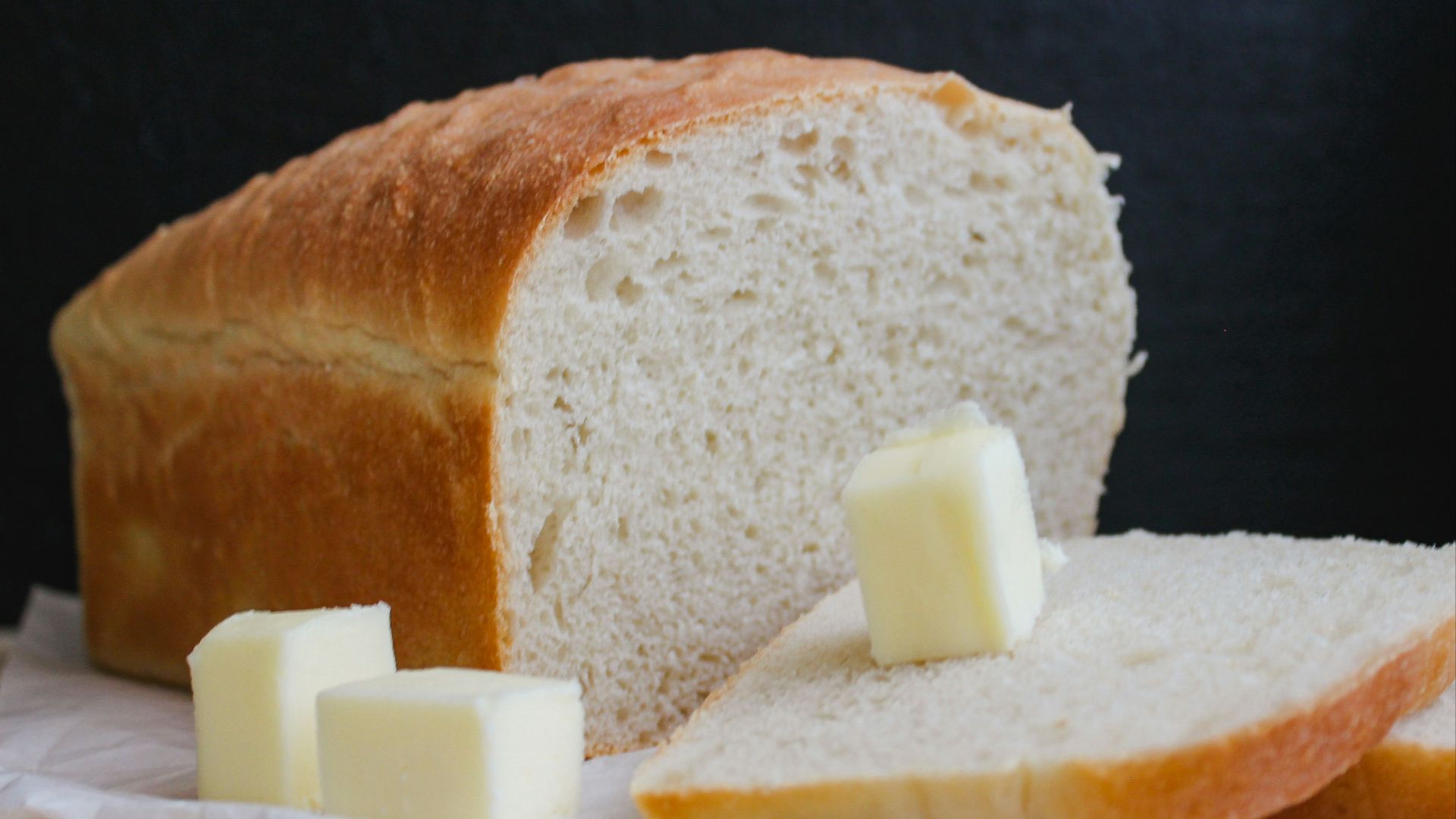 bread on white ceramic plate