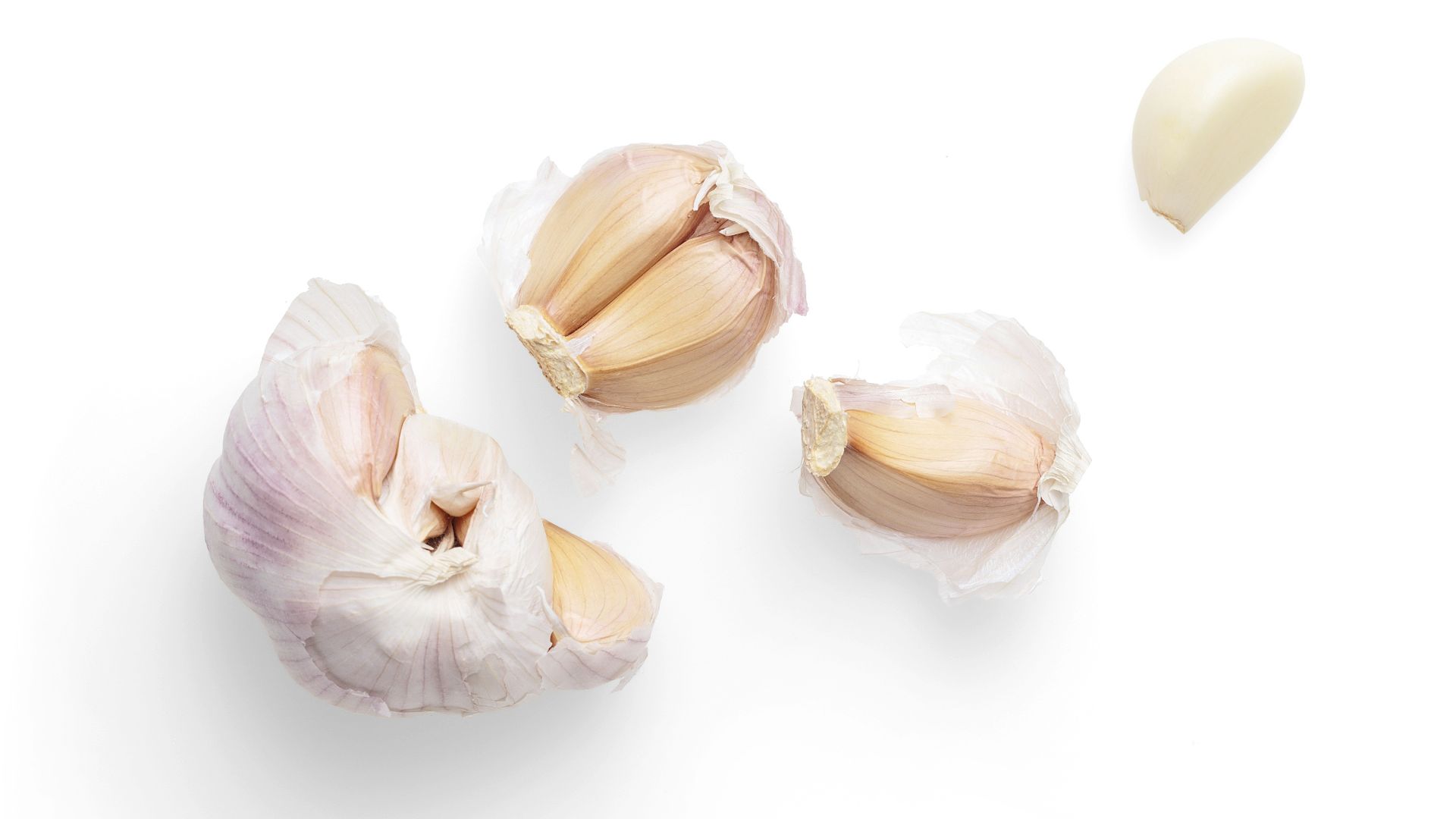 garlic bulb on white surface