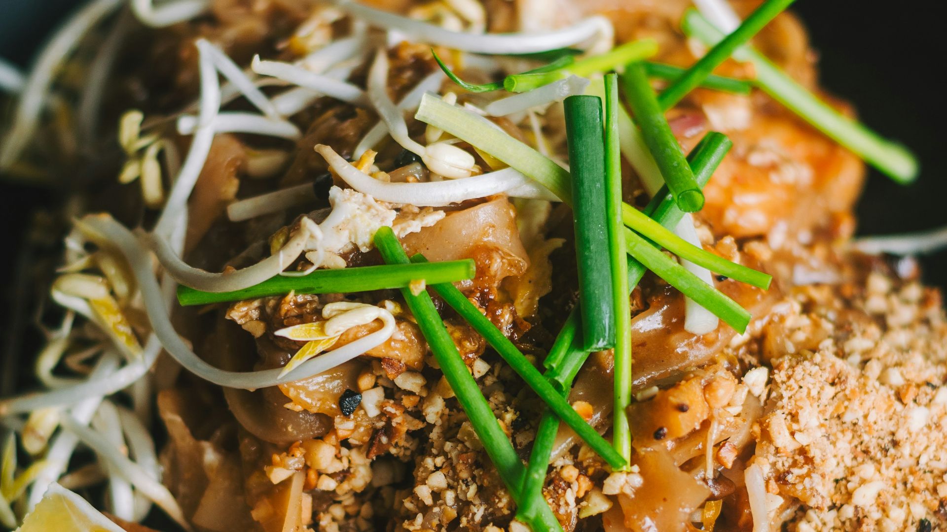 a plate of food on a wooden table