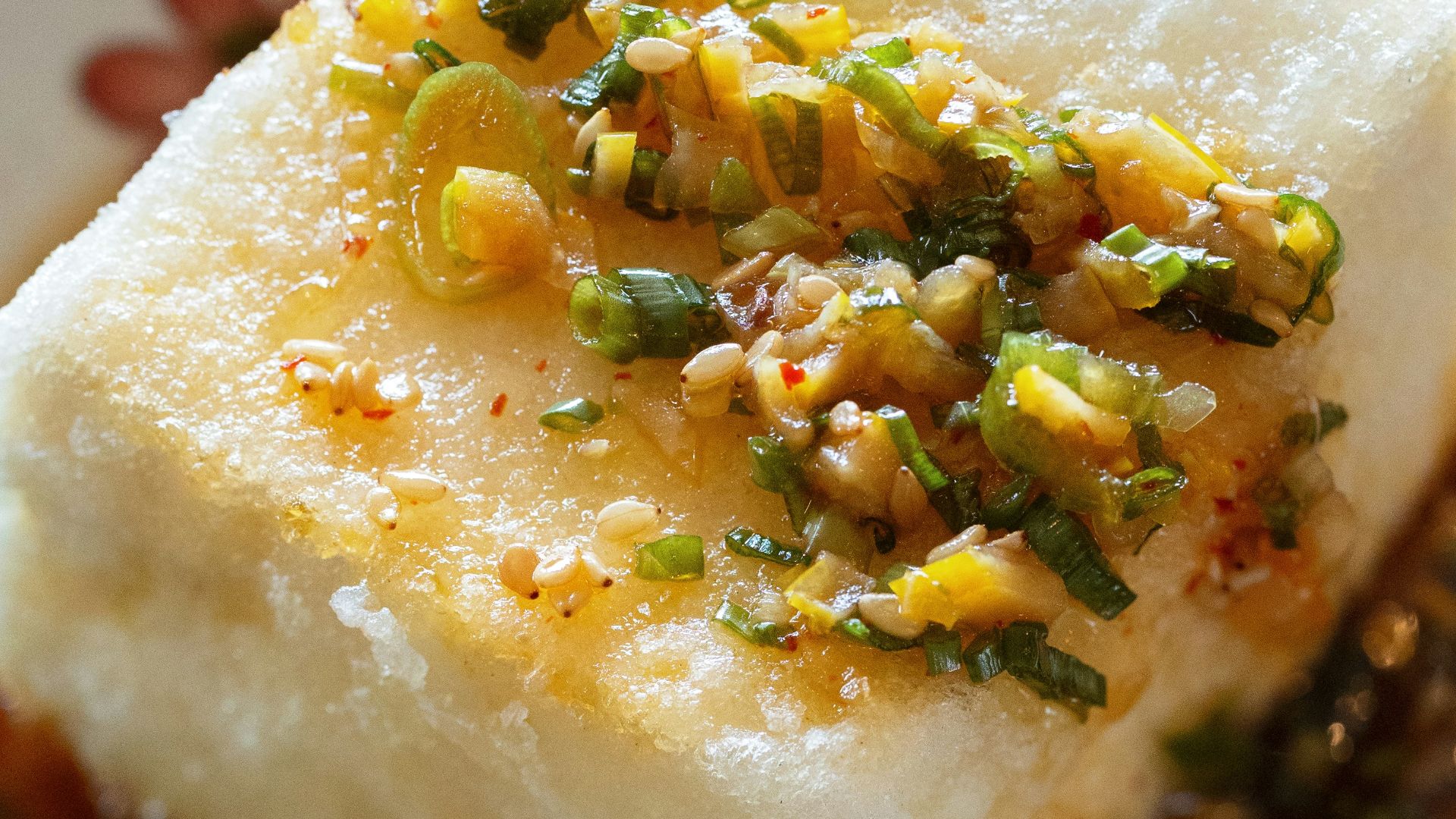 a plate of food on a wooden table