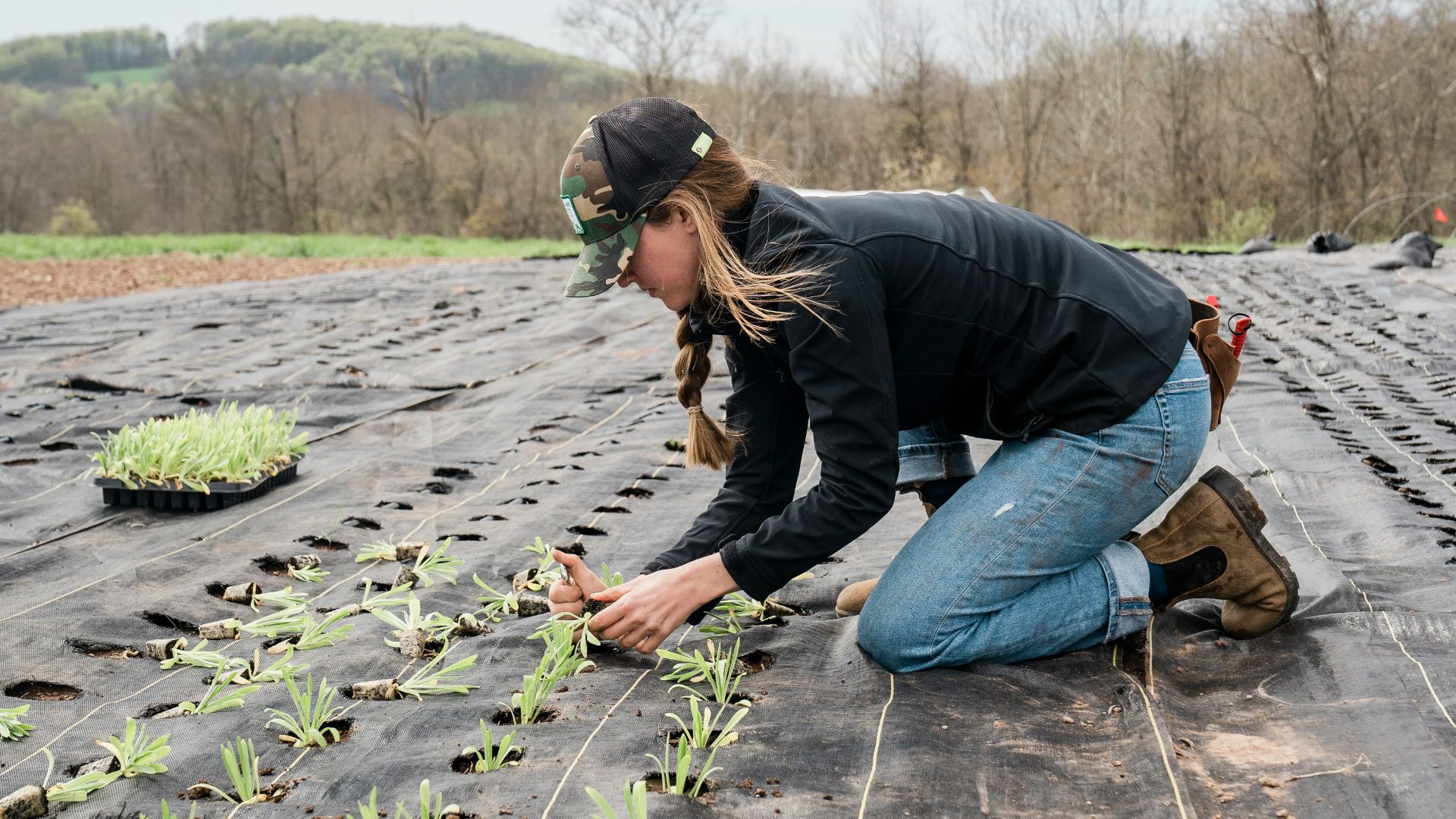 a man kneeling on the ground