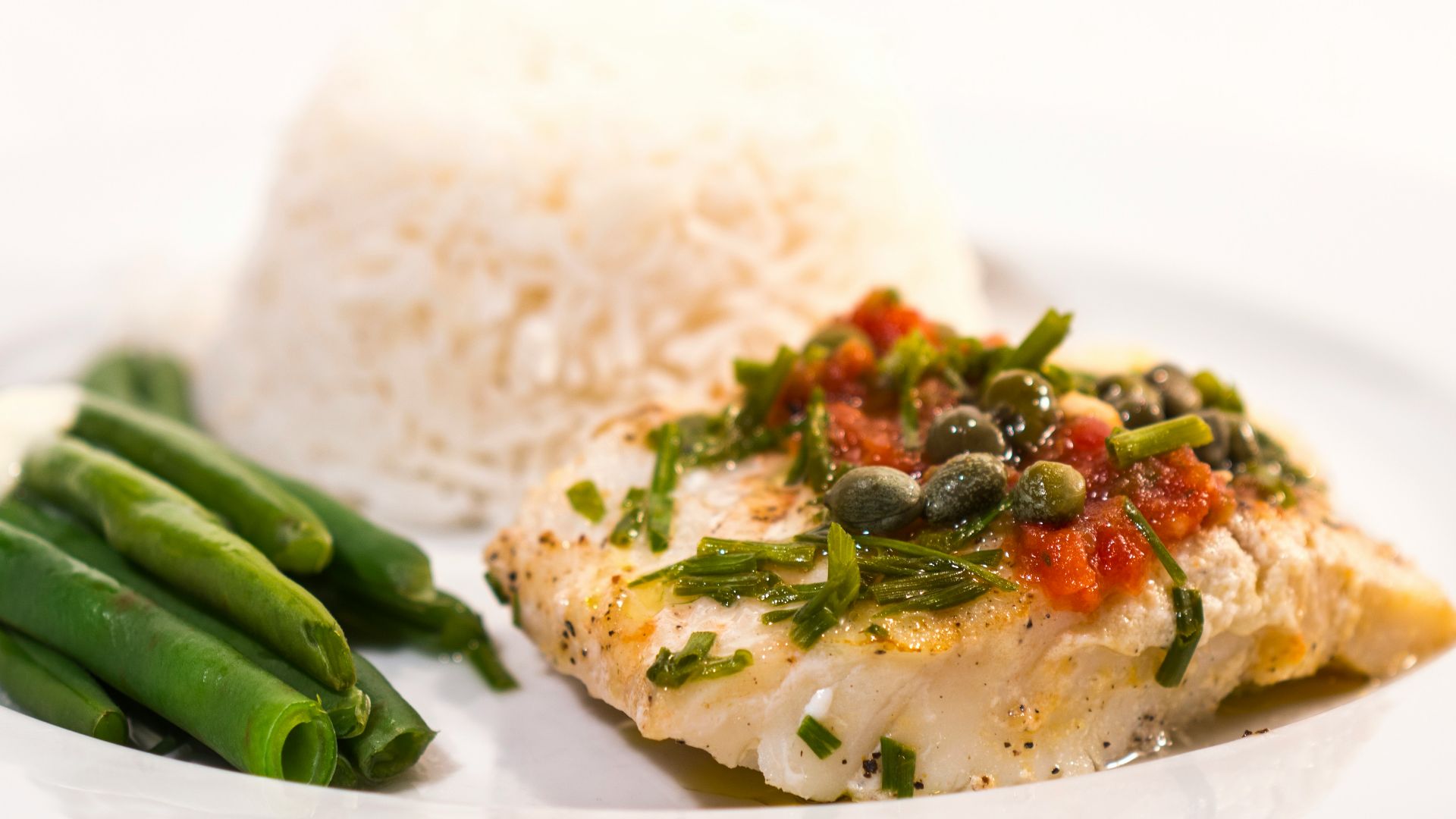 green beans on white ceramic plate