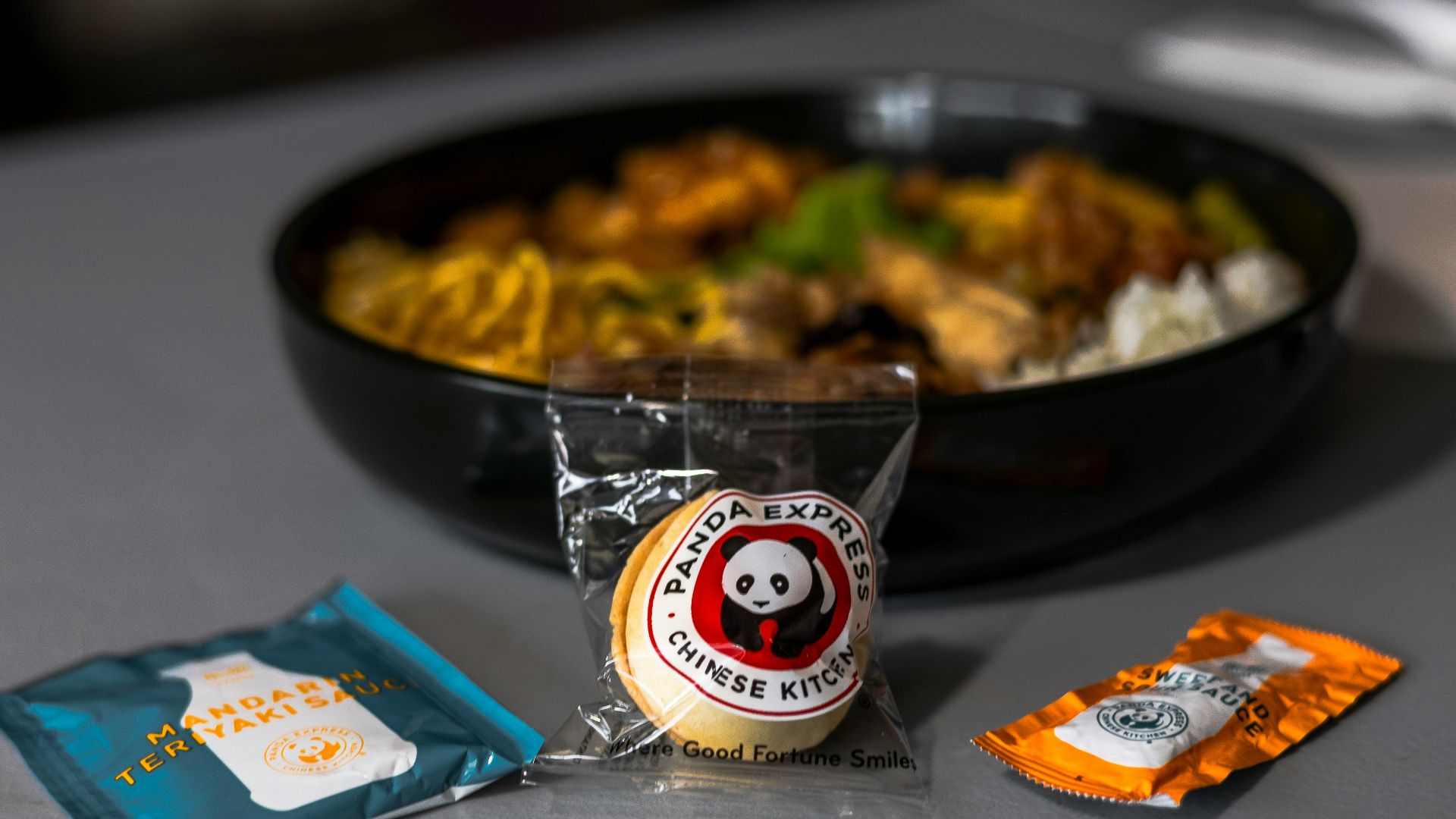 A bowl of food sitting on top of a table