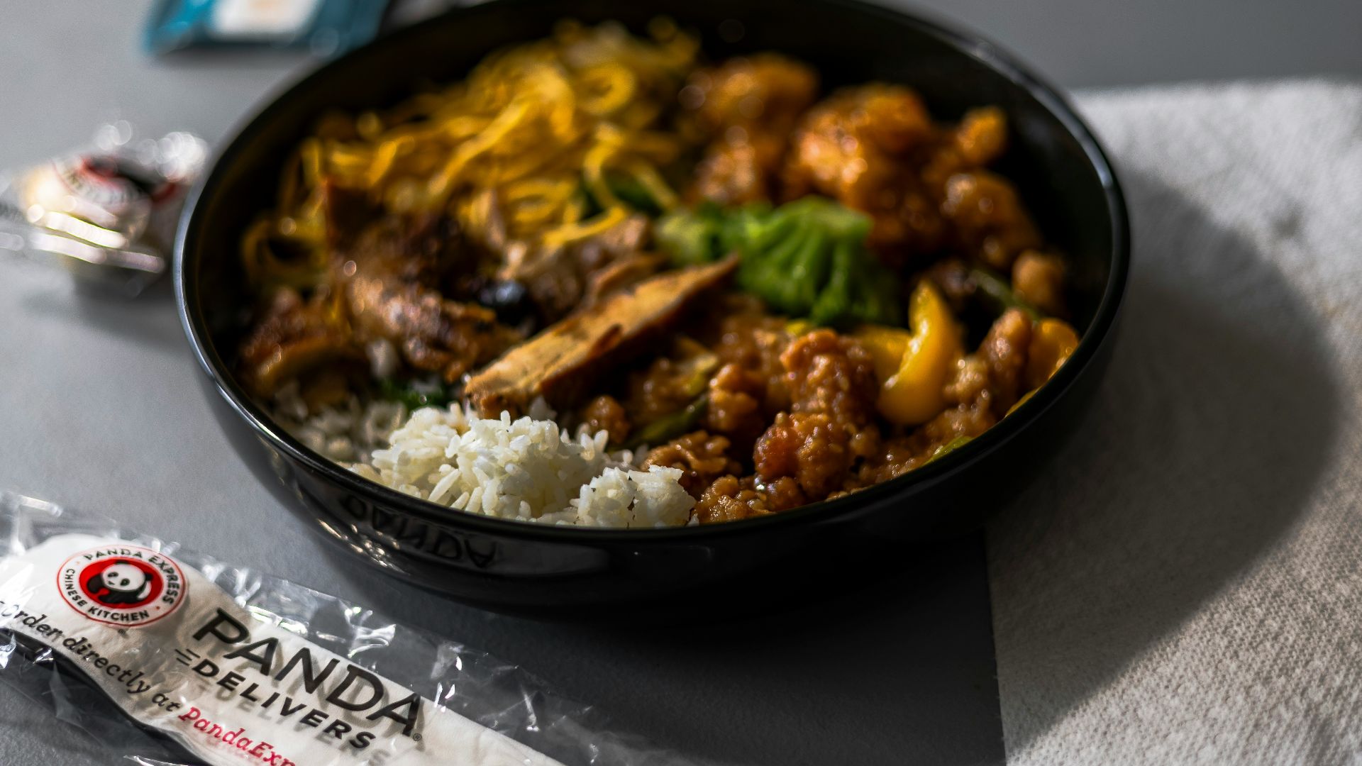 A bowl of food sitting on top of a table
