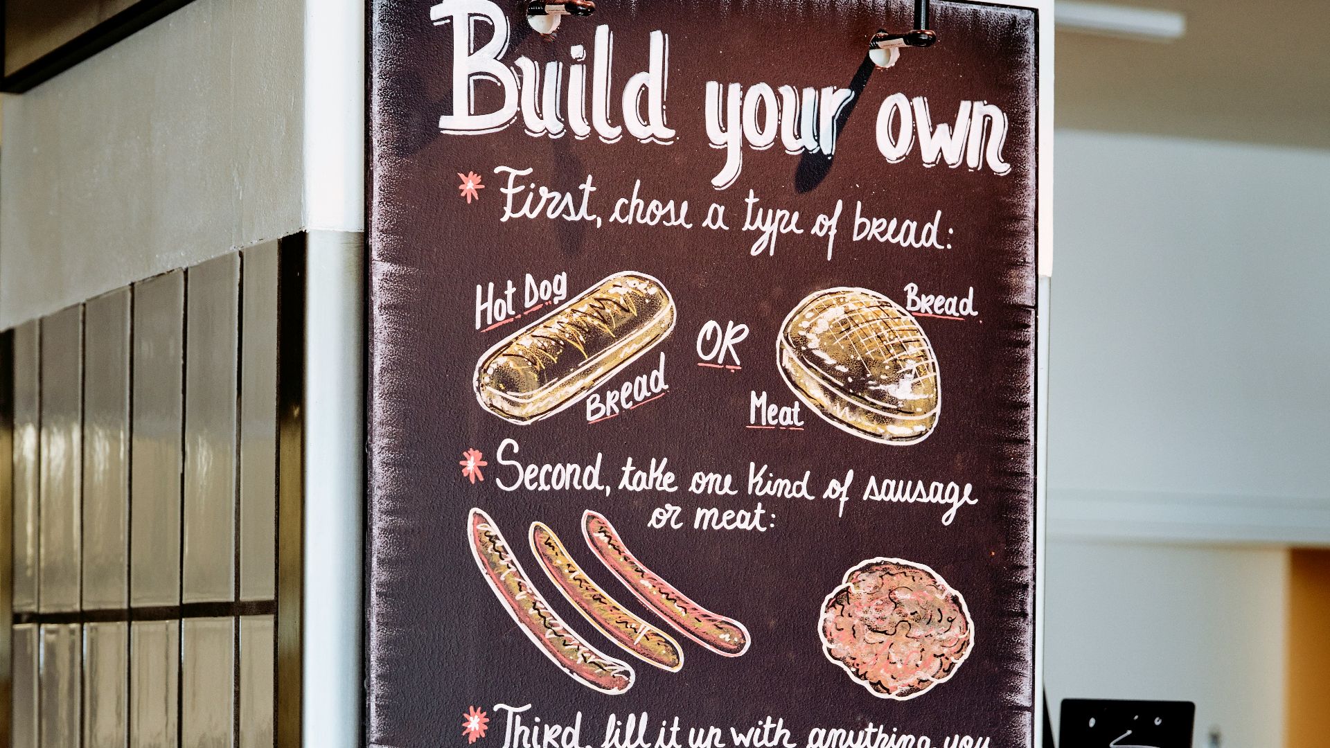 Build Your Own signage on wall