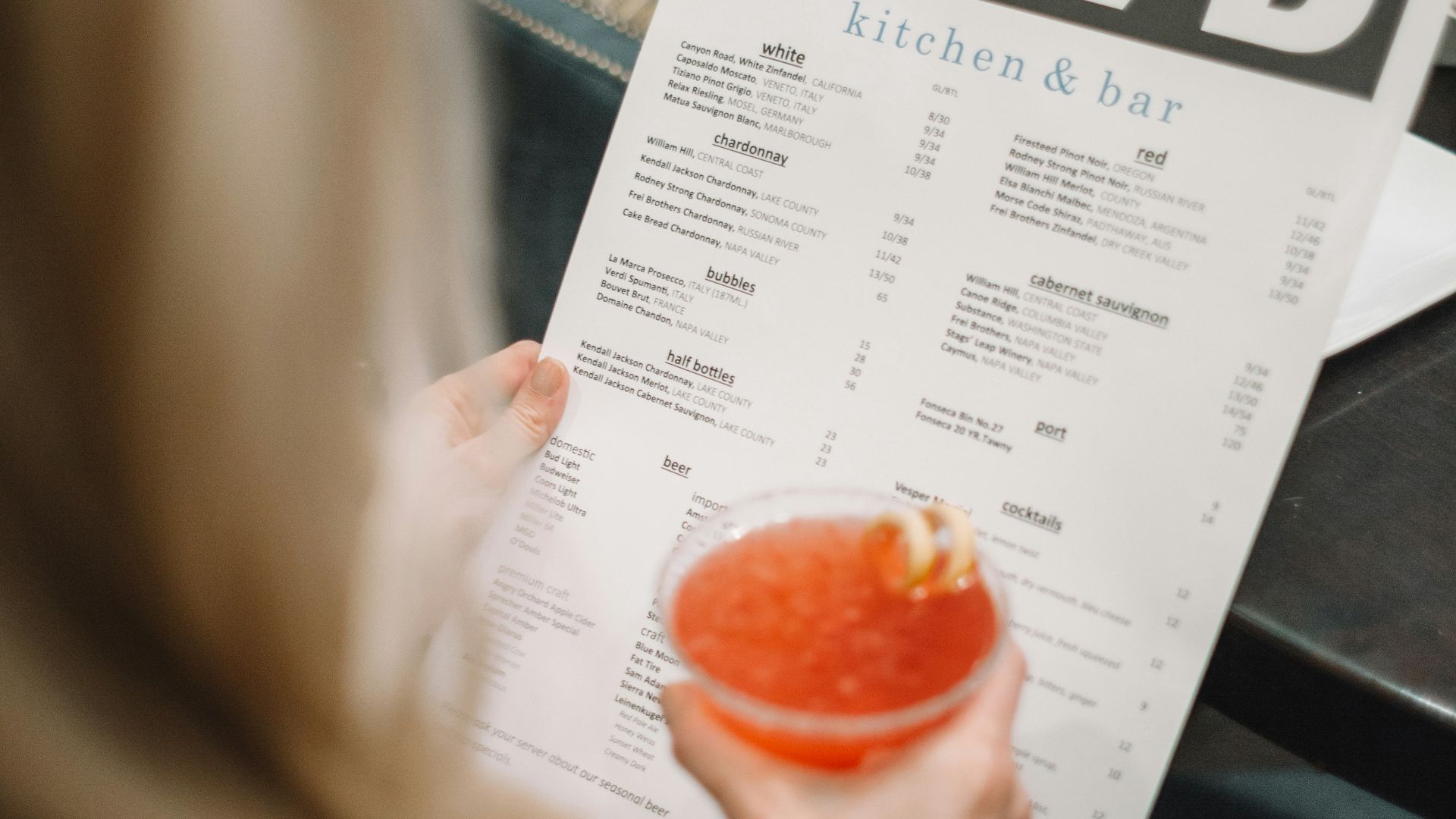 person holding BLVD poster