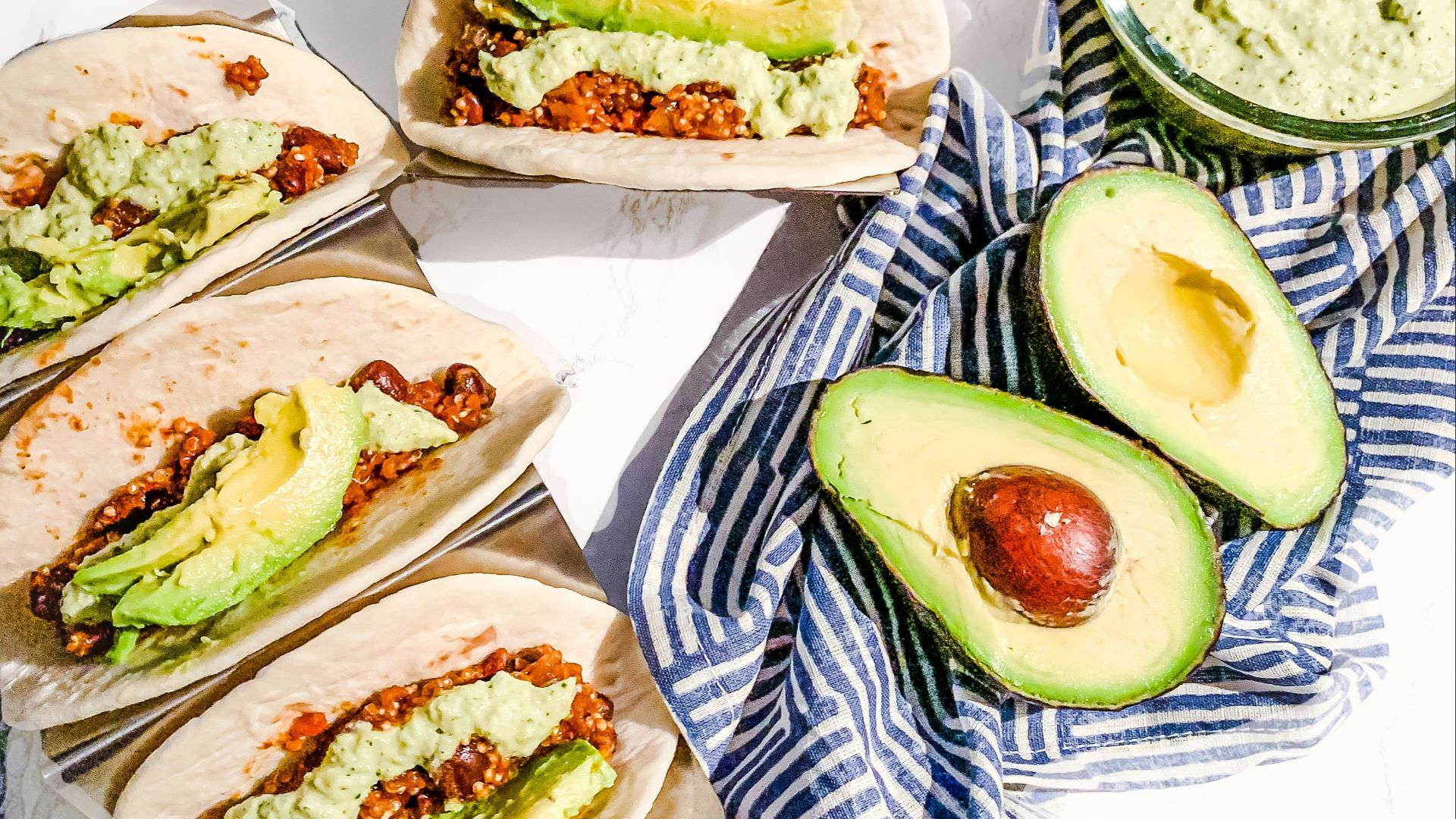 sliced cucumber and green vegetable salad on white ceramic plate