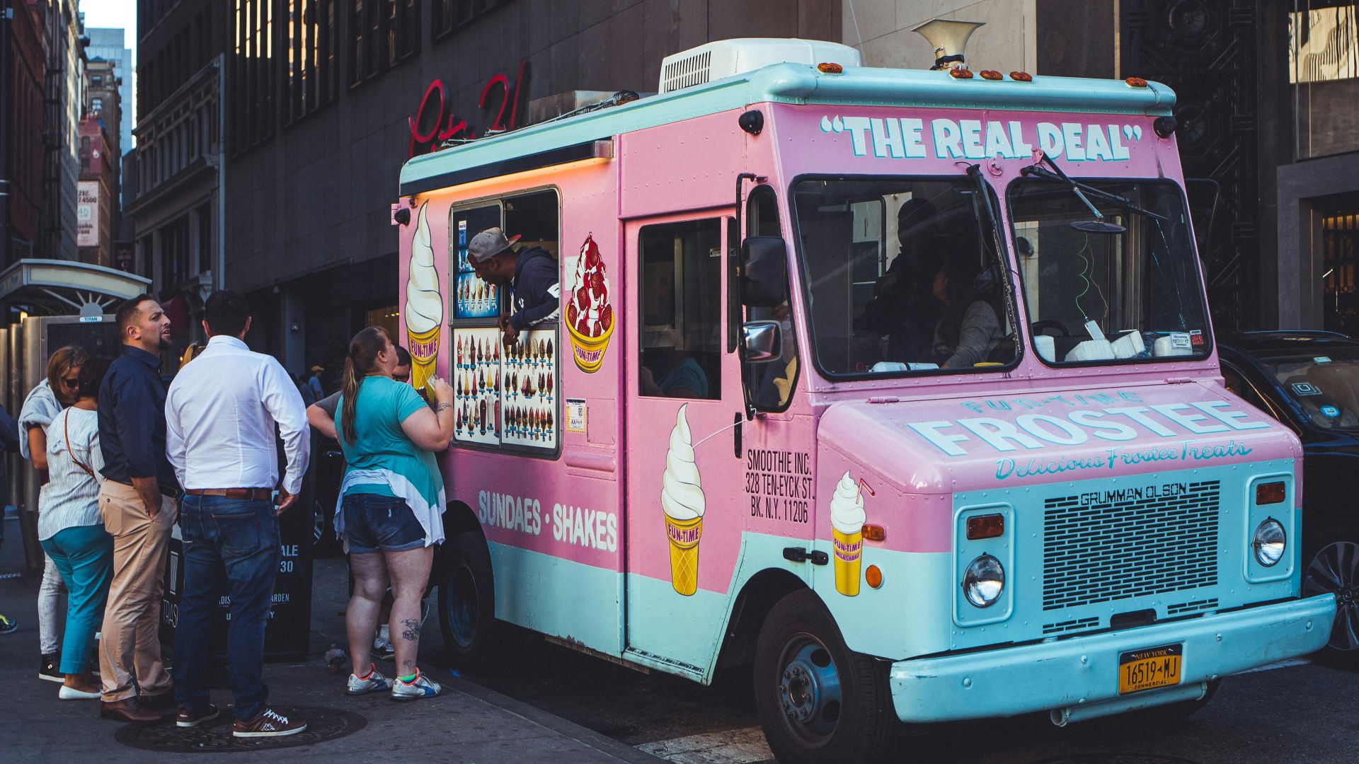 people walking on street during night time