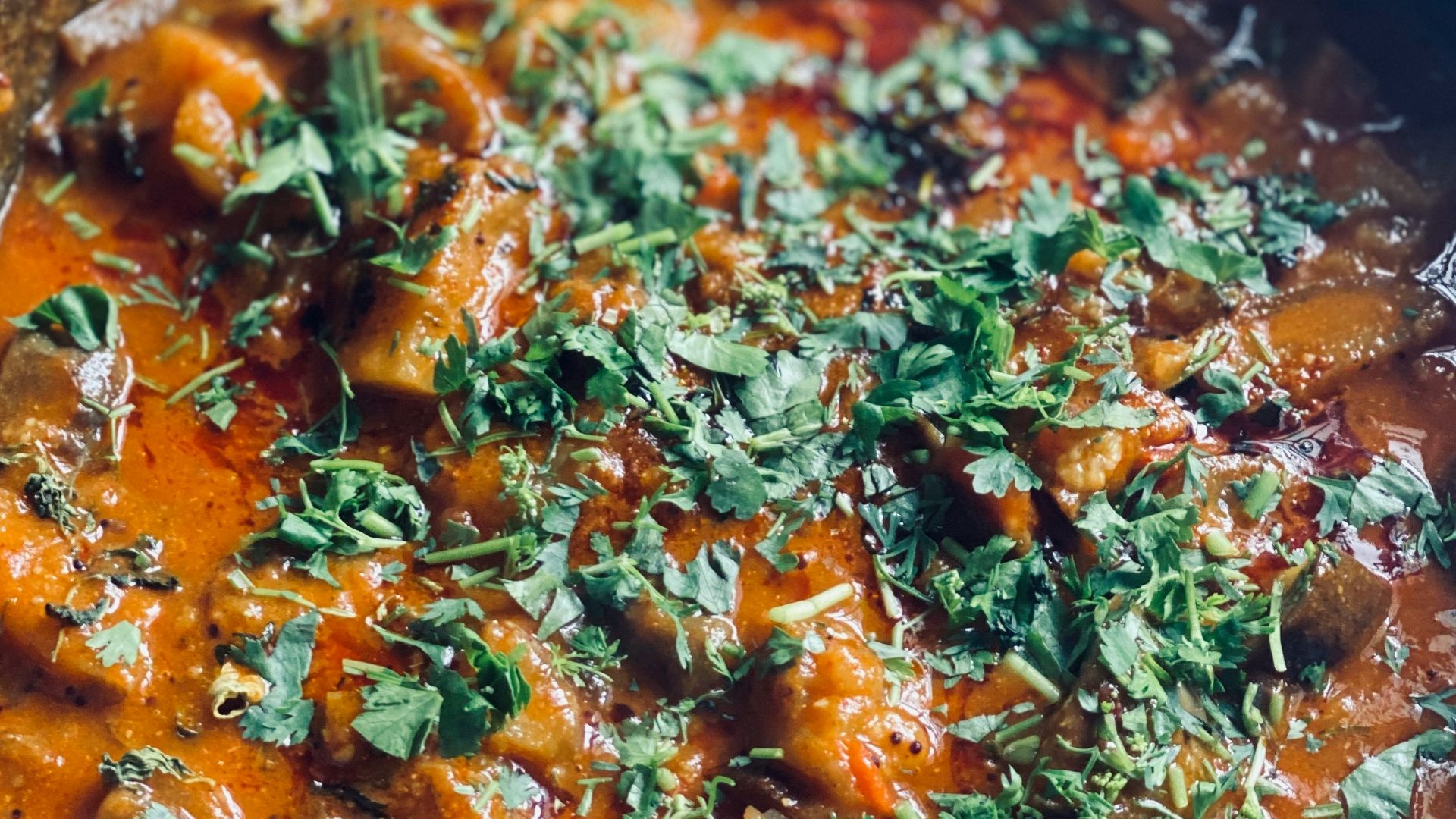 cooked food in black cooking pot