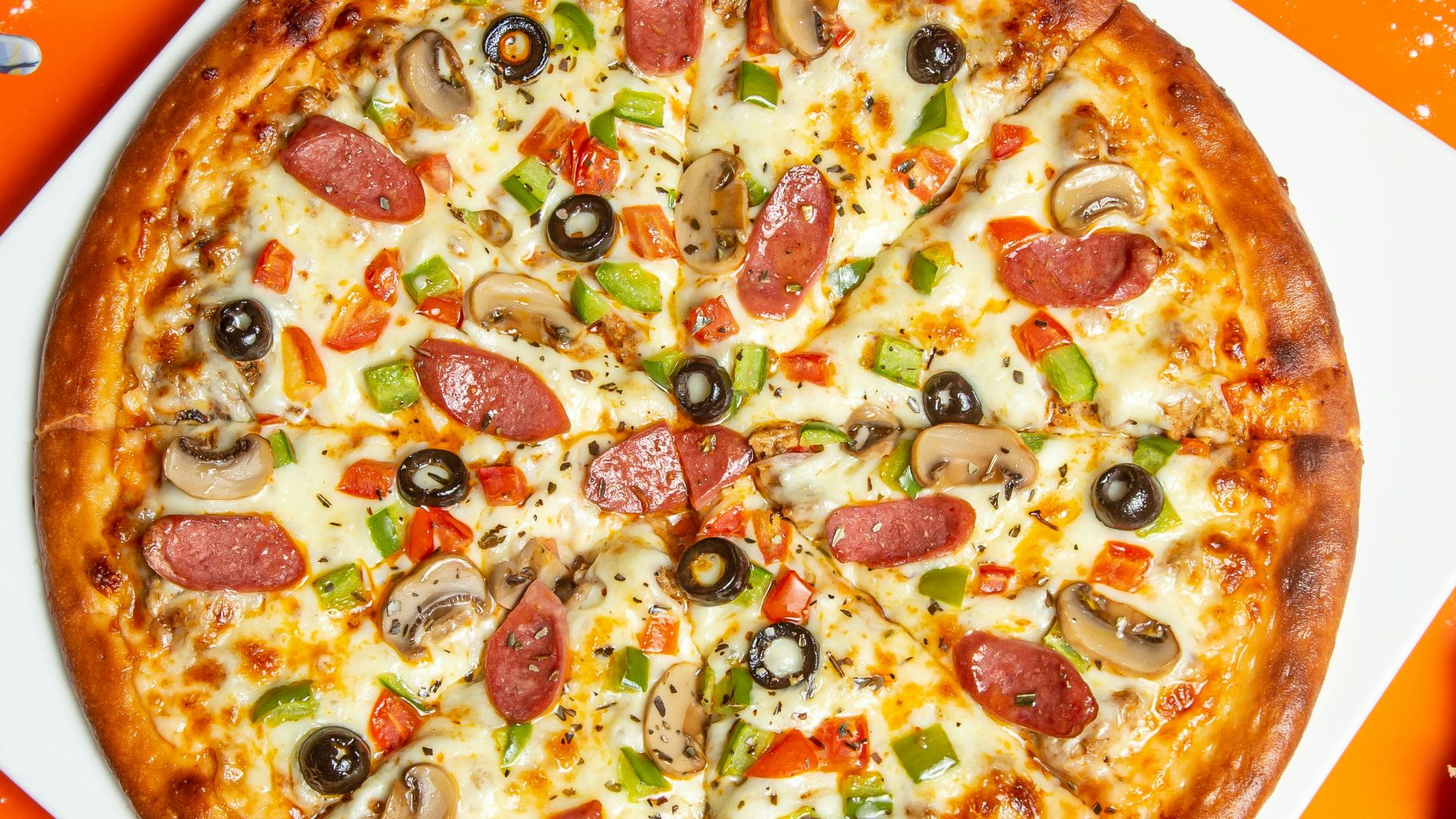 pizza with cheese and green leaf