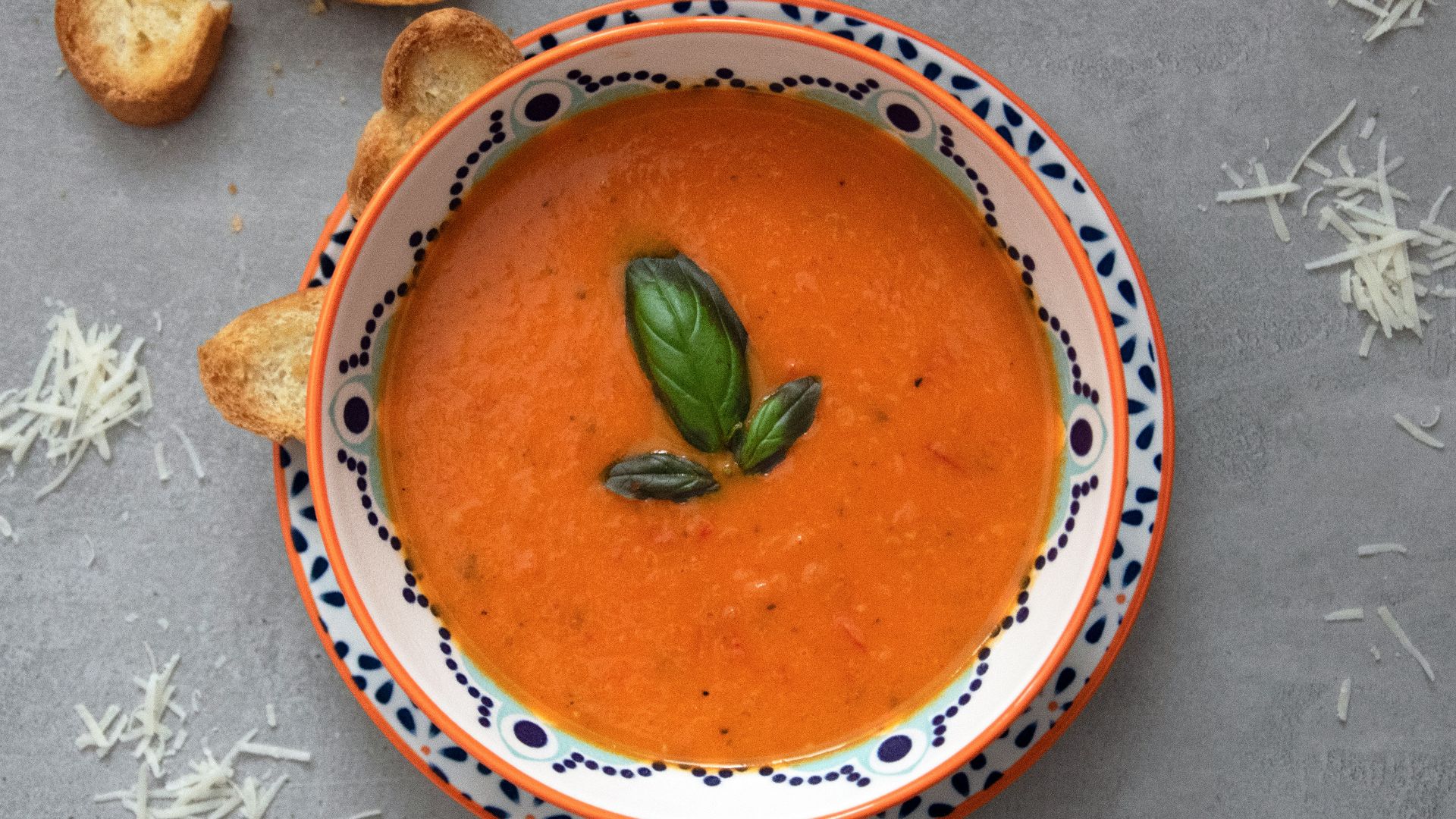 brown soup on white and blue ceramic bowl