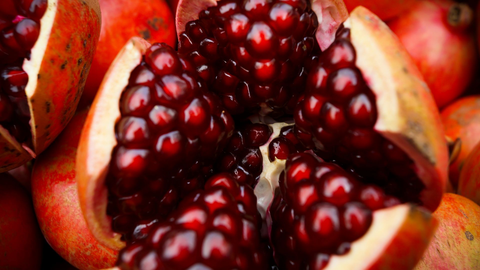 close-up photo of sliced pomegranate