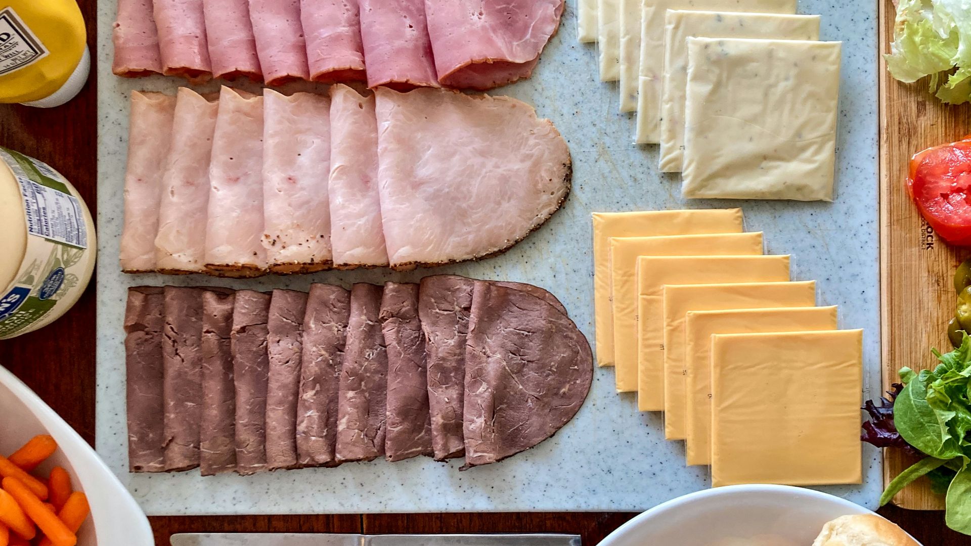 a variety of food is laid out on a table