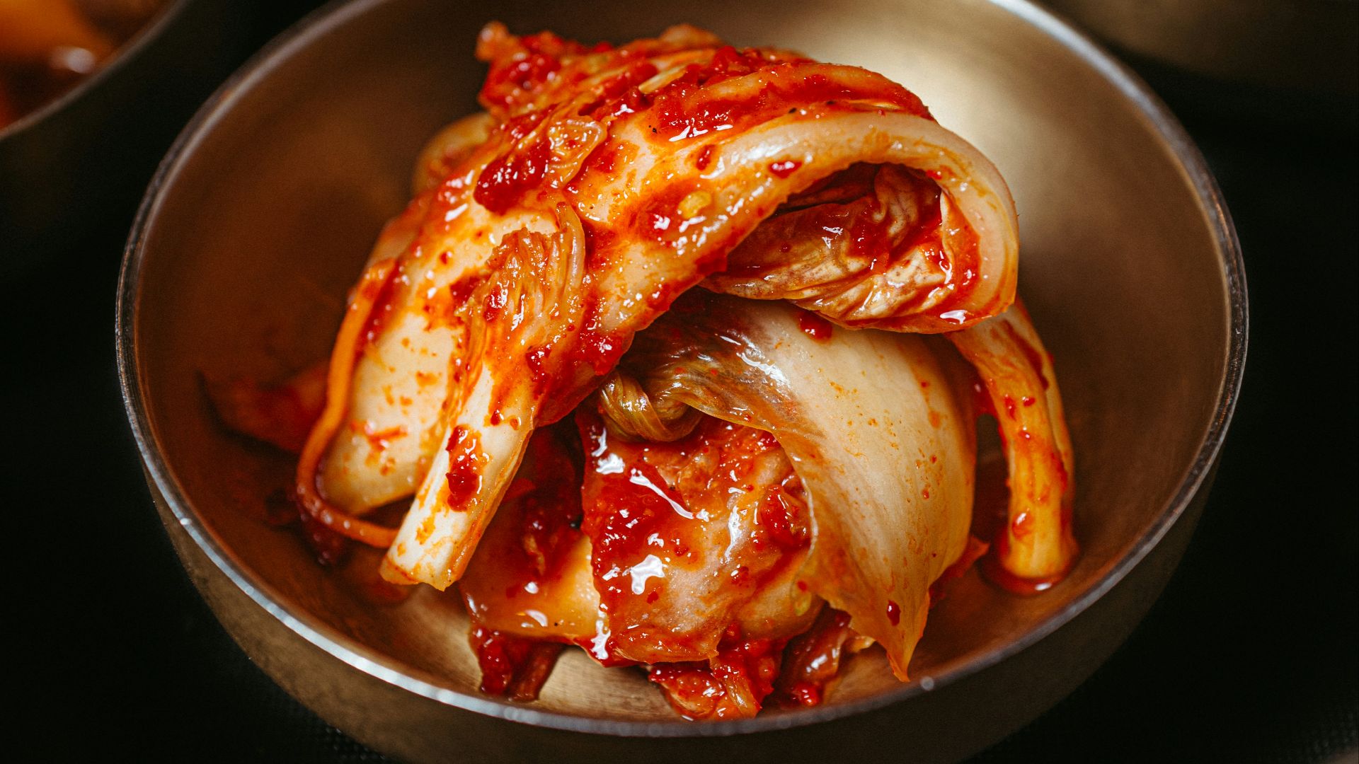 a table topped with bowls filled with food