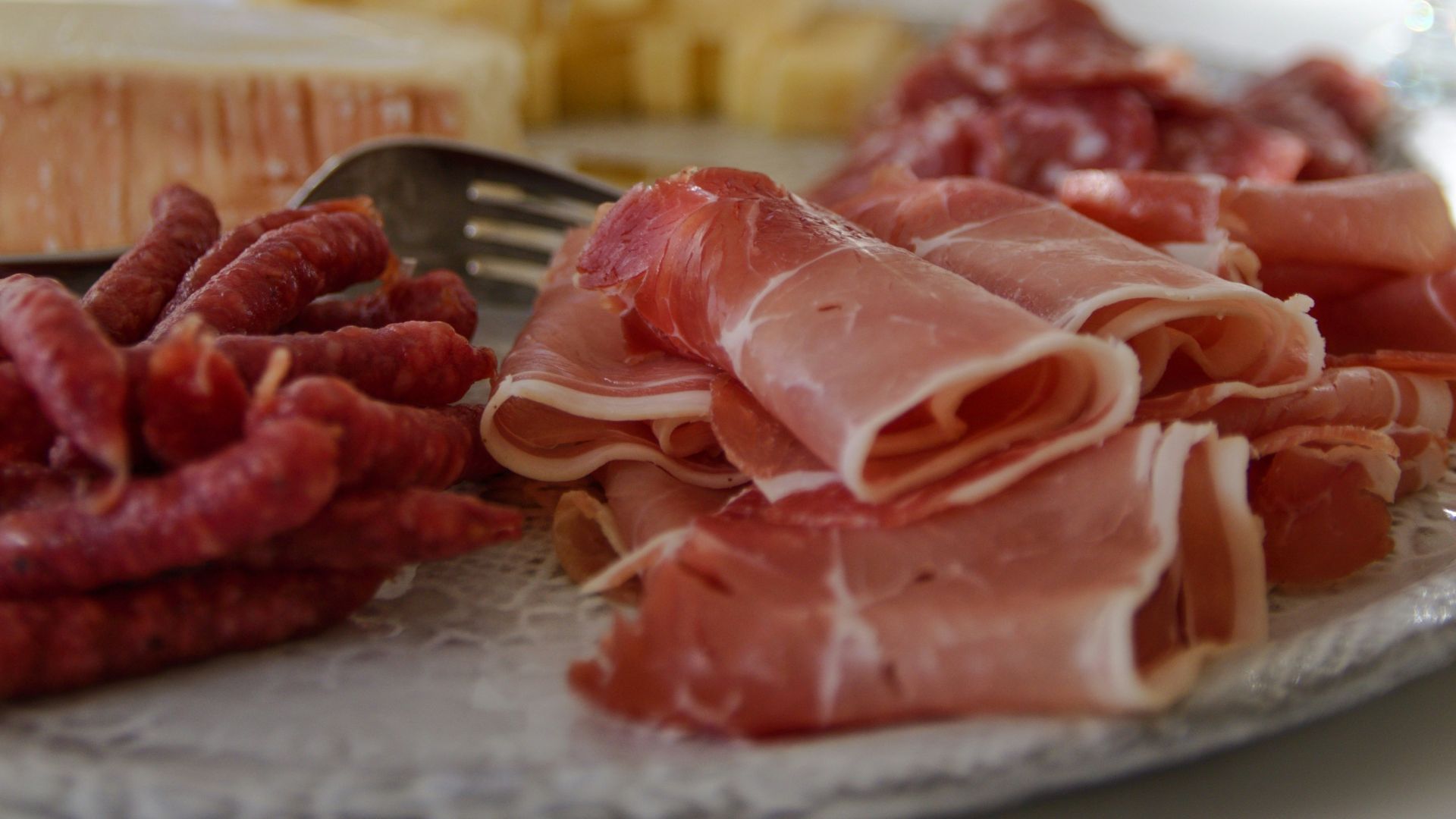 raw meat on white ceramic plate