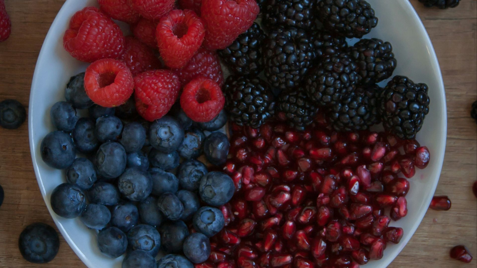 strawberries on white ceramic bowl