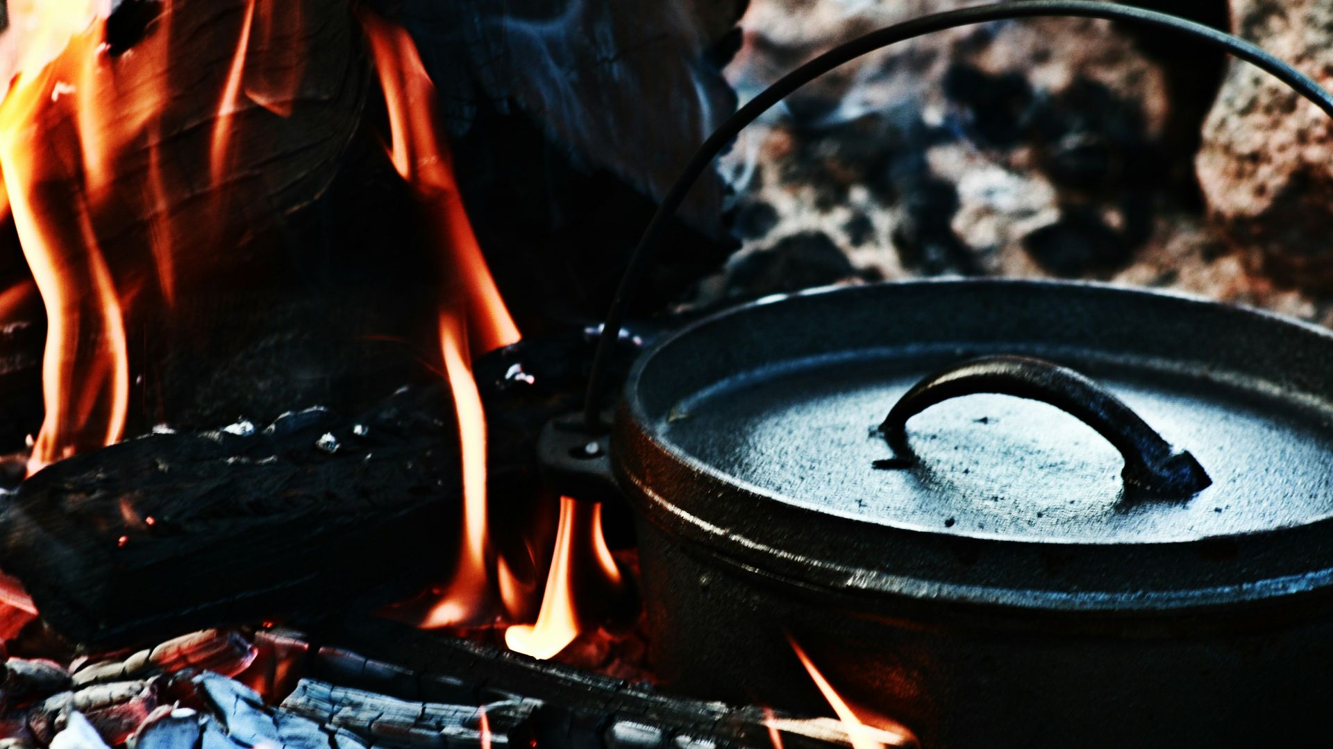 black round pot on fire