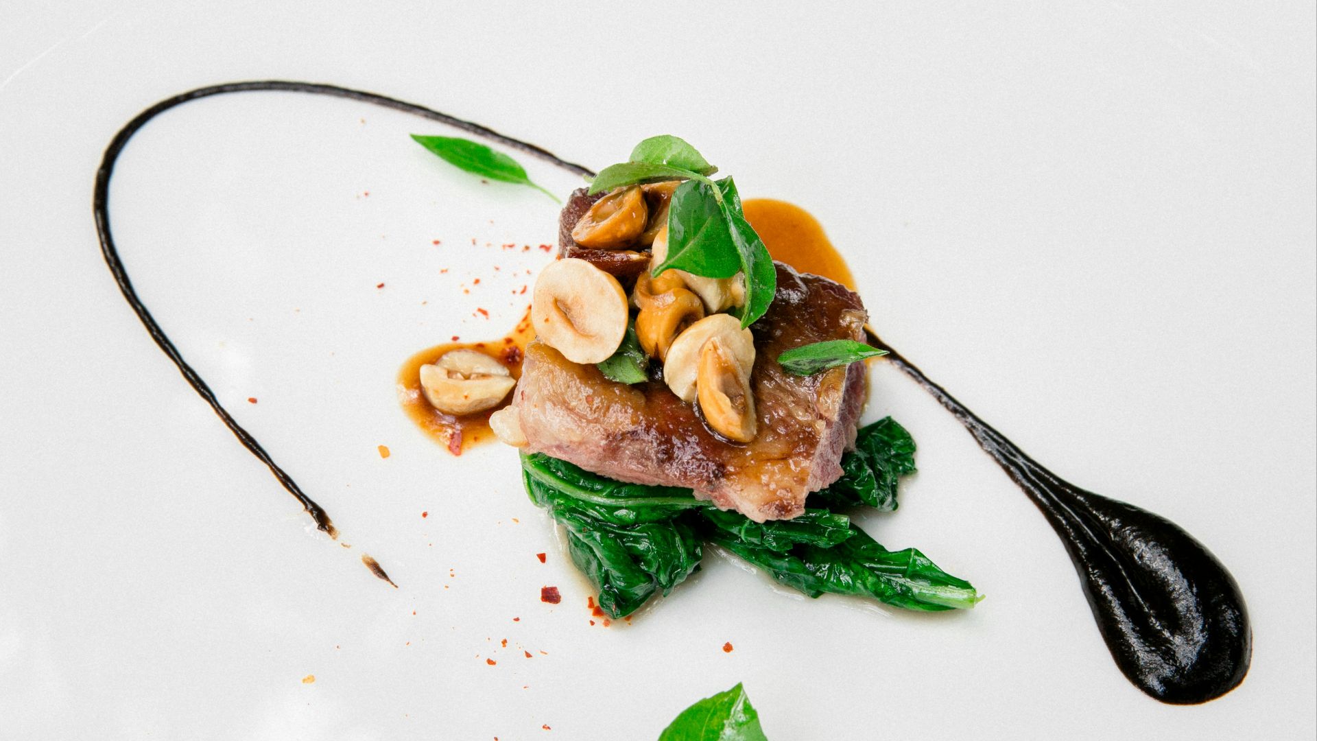 stainless steel fork on white ceramic plate