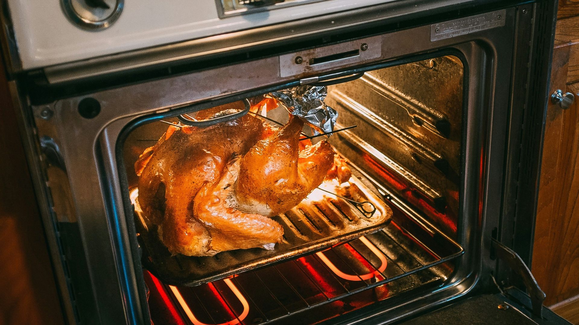 grilled chicken on black and silver grill
