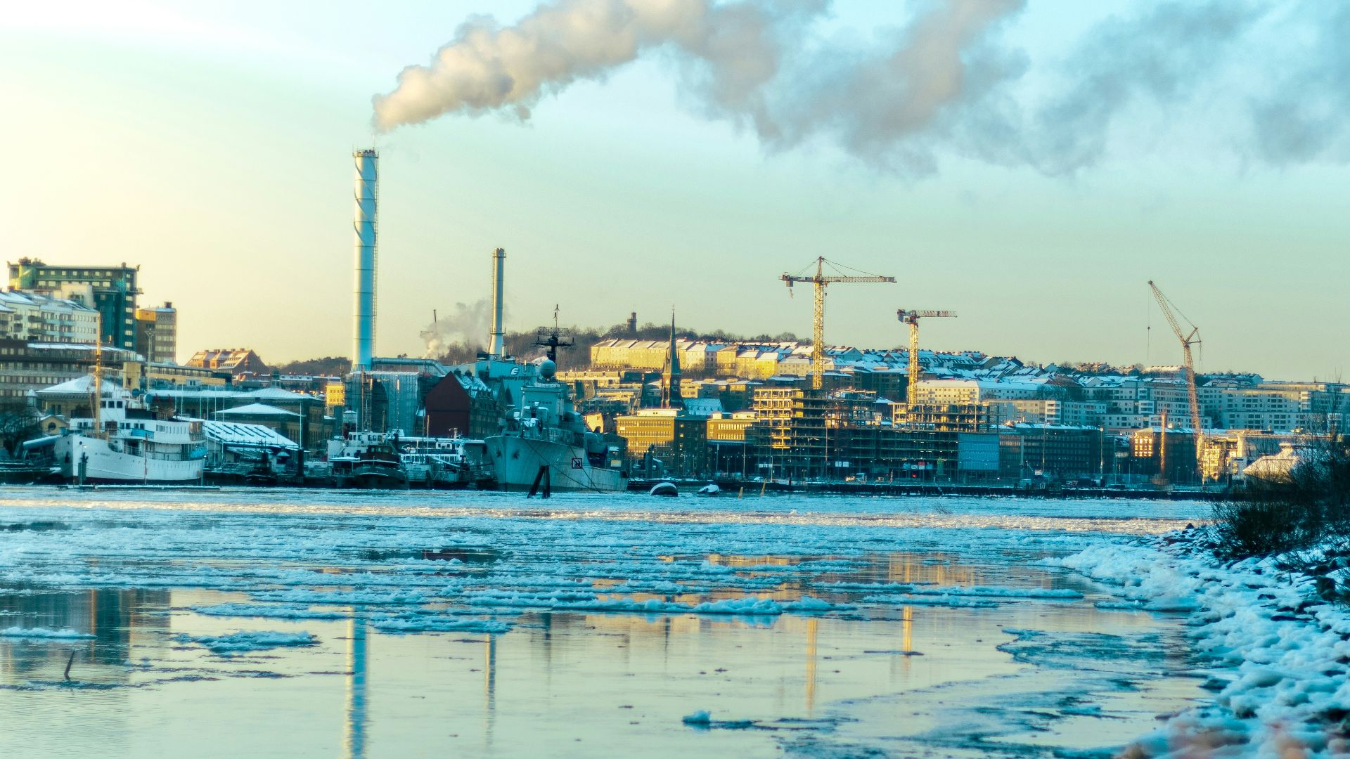 blue and white boat on water under white clouds and blue sky during daytime