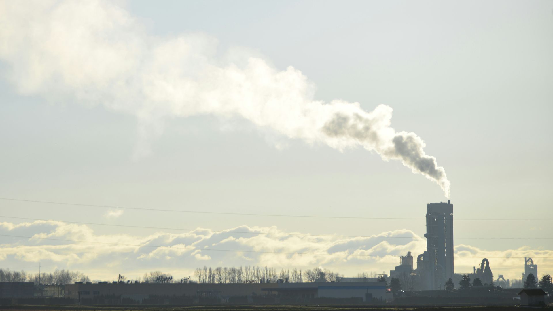 A factory with smoke coming out of it